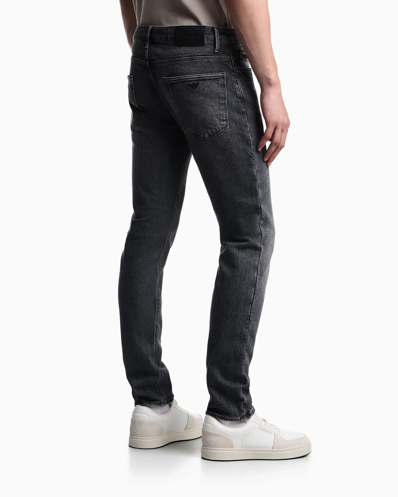 Emporio Armani J06 slim-fit washed denim jeans with eagle embroidery