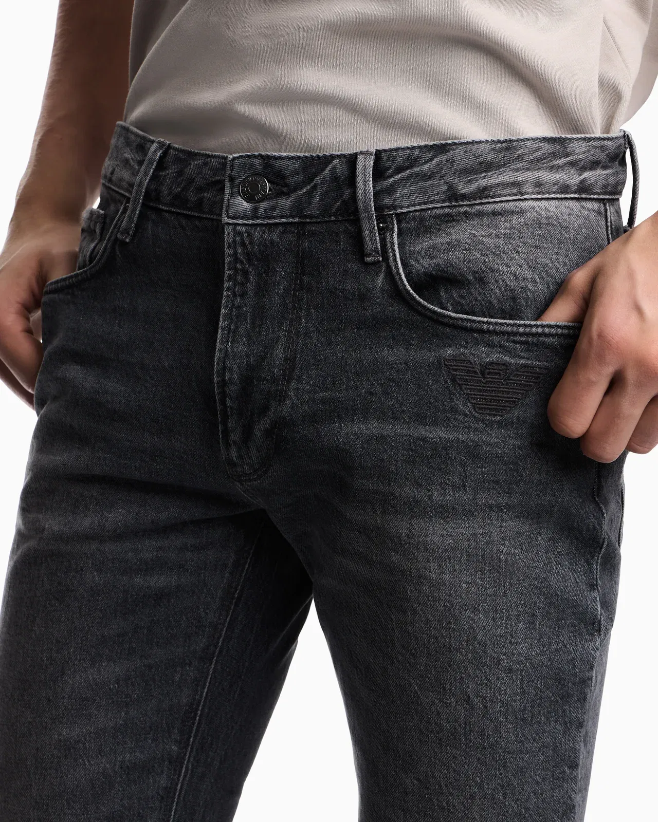 Emporio Armani J06 slim-fit washed denim jeans with eagle embroidery