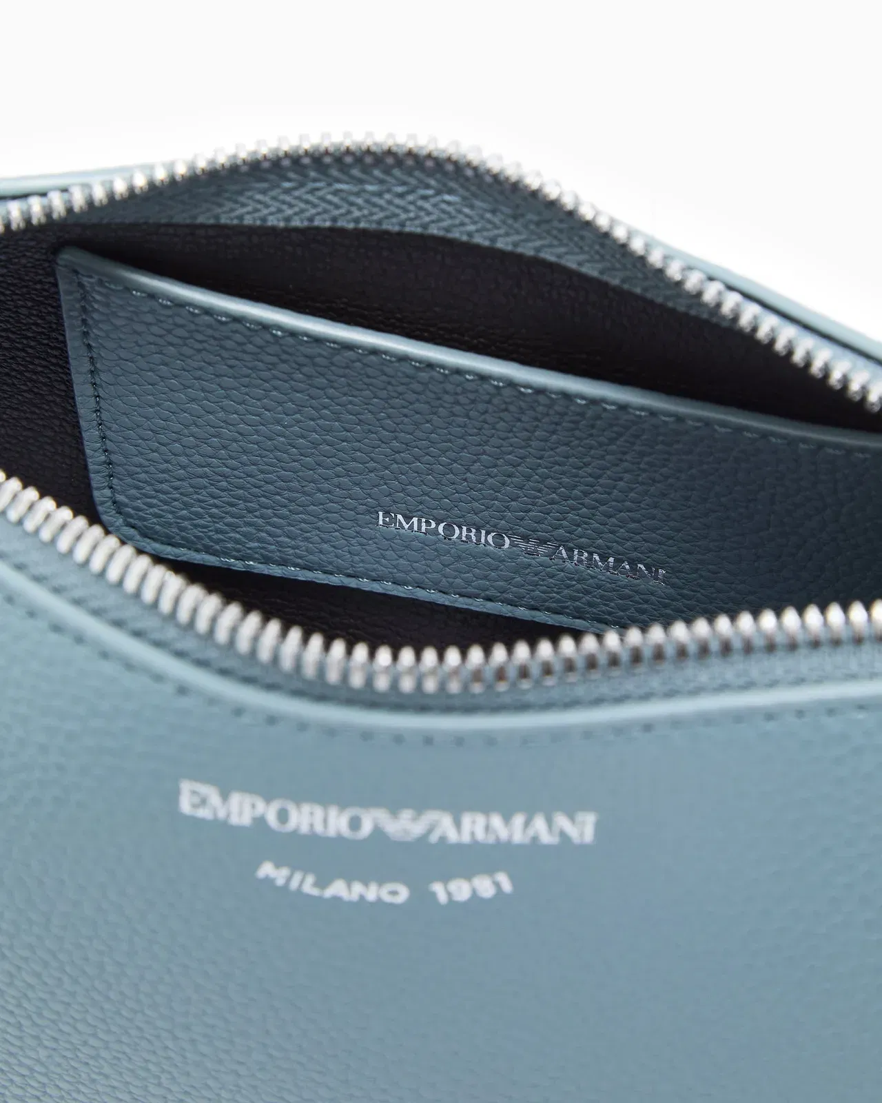 Emporio Armani Pebbled shoulder bag with a zip closure and adjustable strap