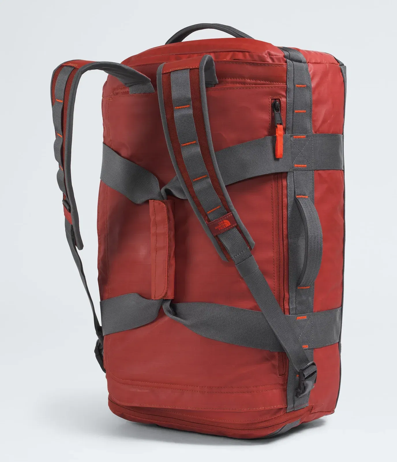 The North Face Base Camp™ Voyager Duffel—42L Iron Clay-Anthracite Grey-Lava Red