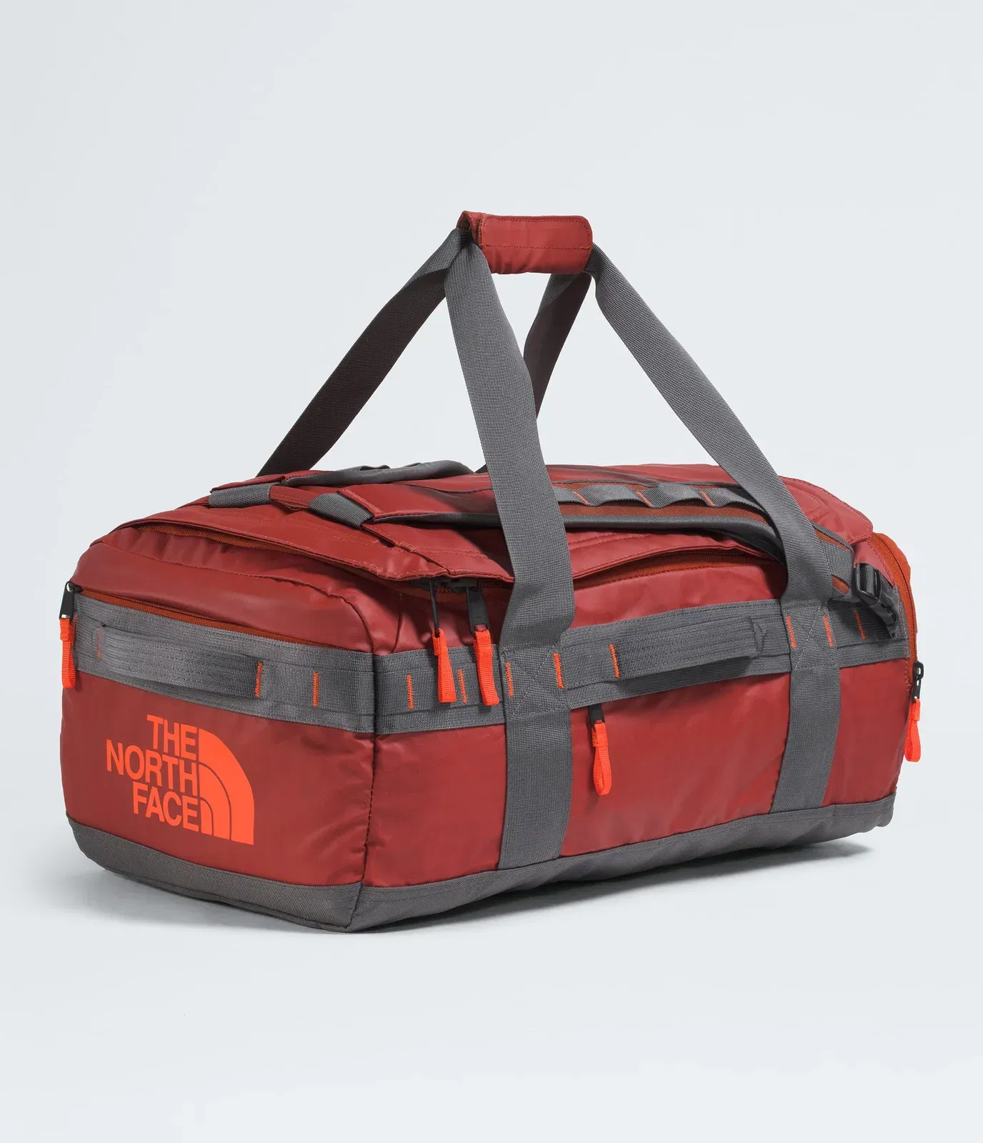 The North Face Base Camp™ Voyager Duffel—42L Iron Clay-Anthracite Grey-Lava Red