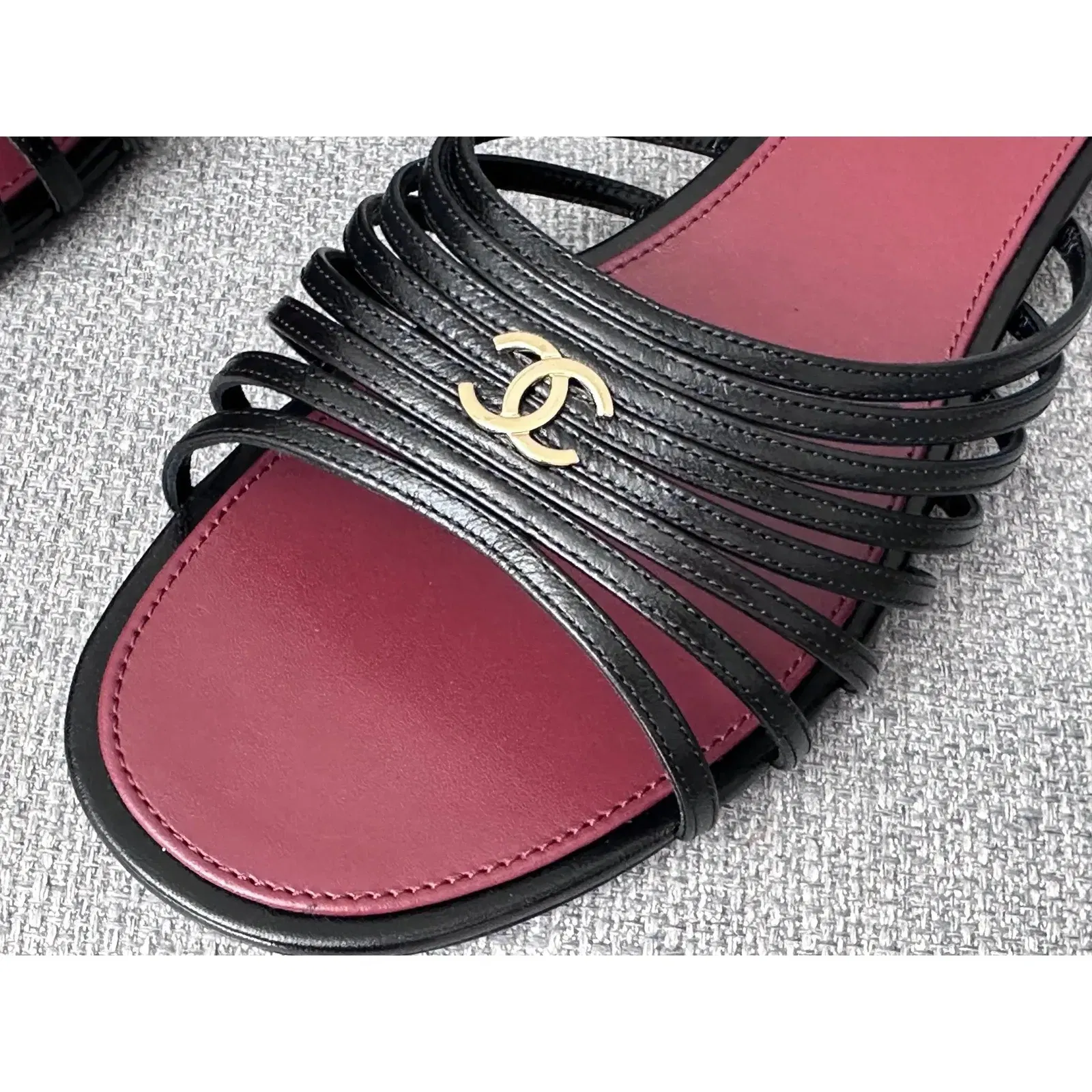 Chanel sandals crafted from black leather