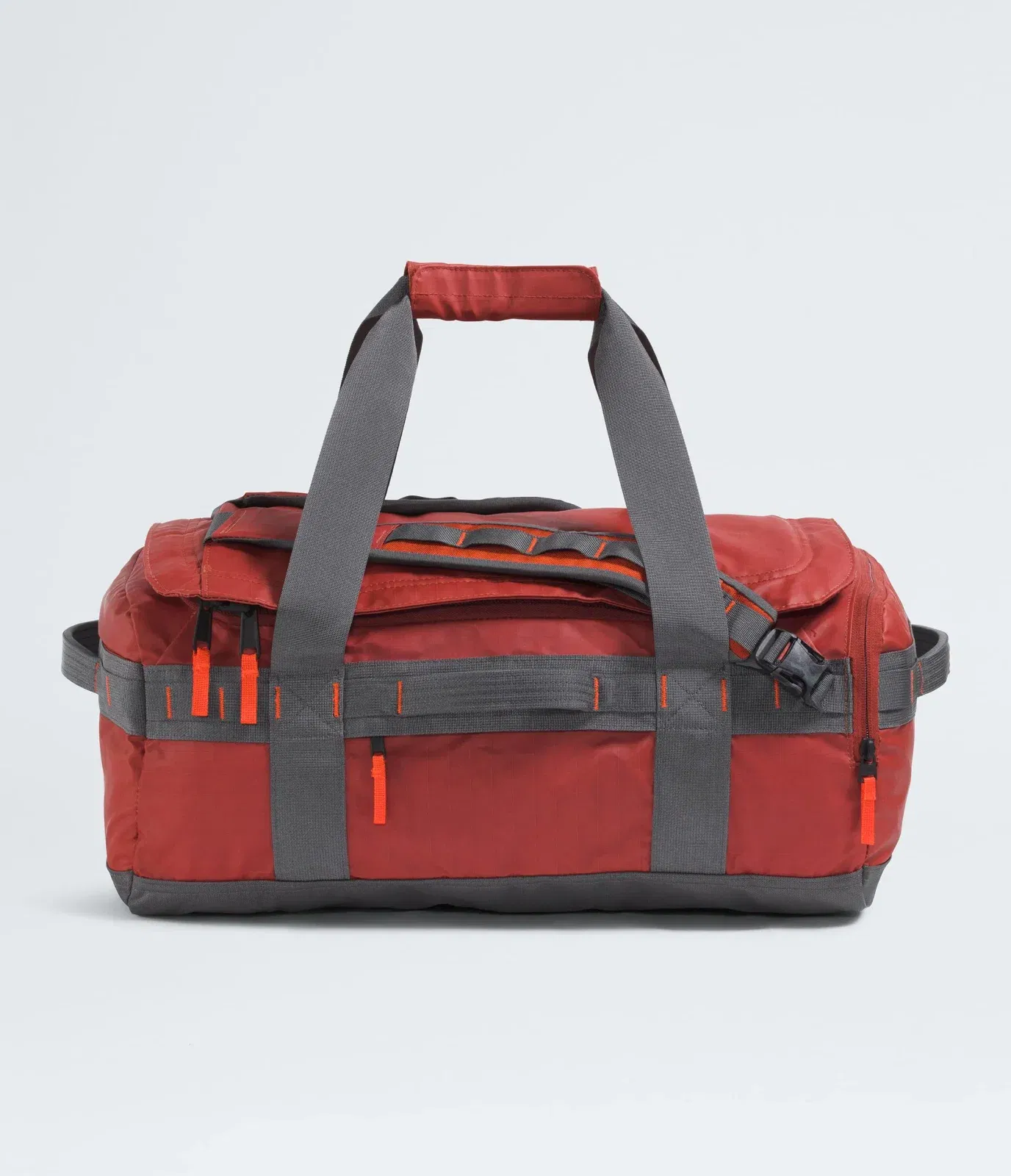 The North Face Base Camp™ Voyager Duffel—42L Iron Clay-Anthracite Grey-Lava Red