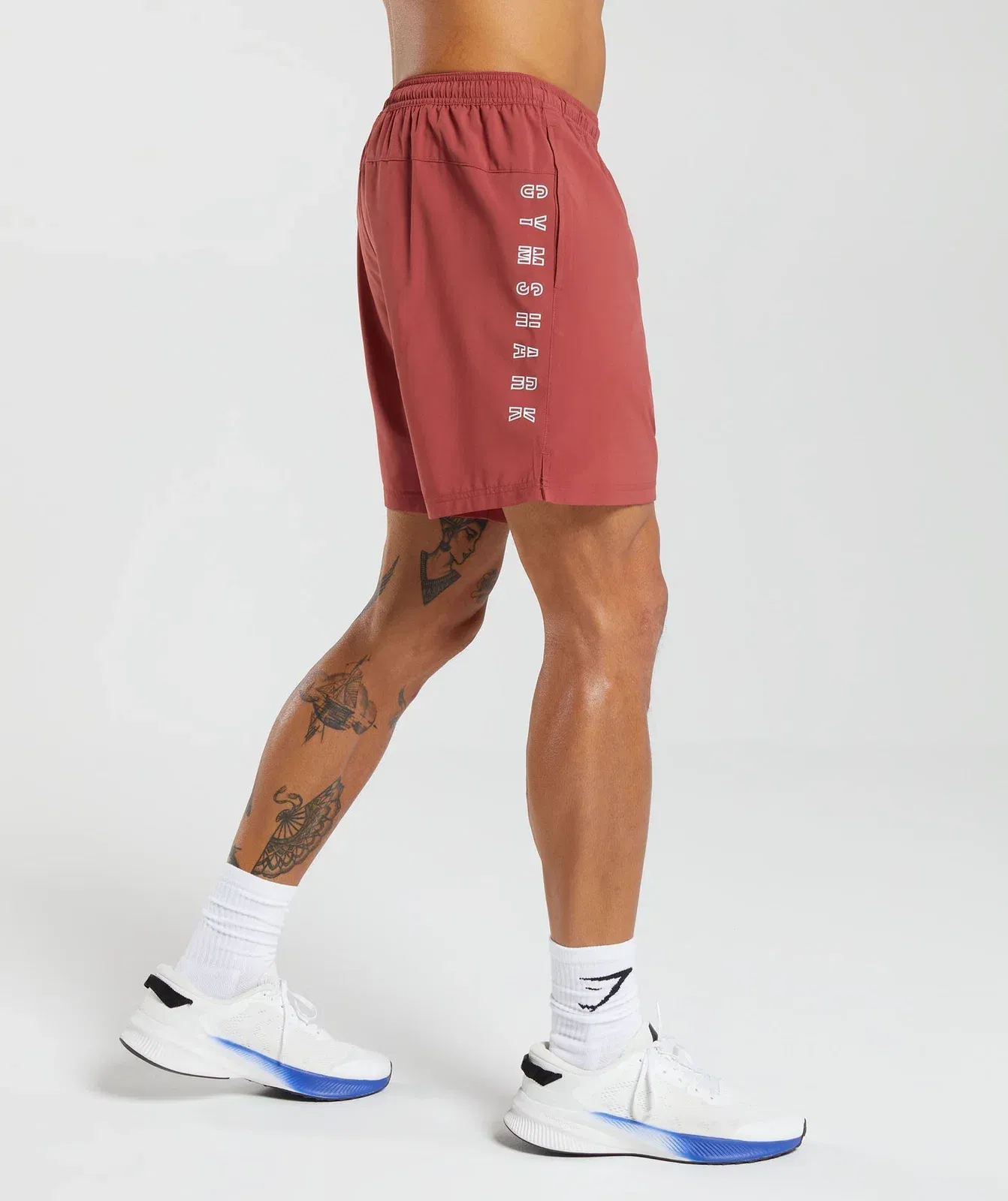 Gymshark Strike Shorts - Rust Red