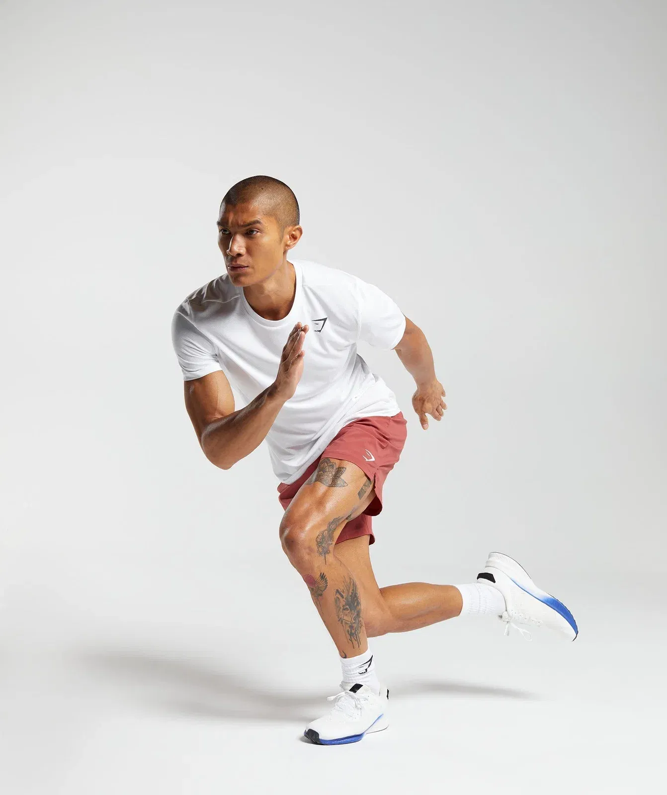 Gymshark Strike Shorts - Rust Red
