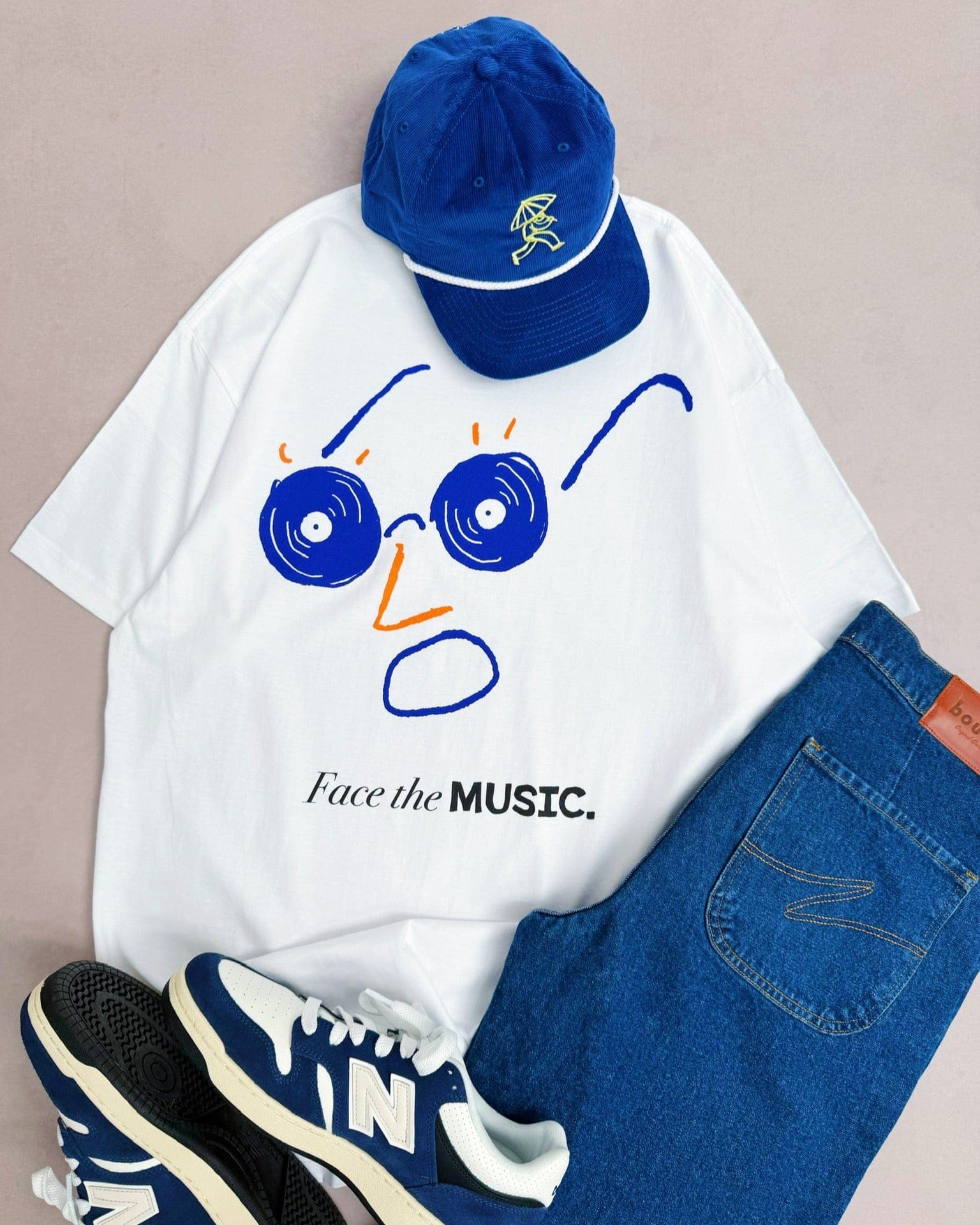 Rainy Heart x UN:IK 'Face the Music' Tee - White