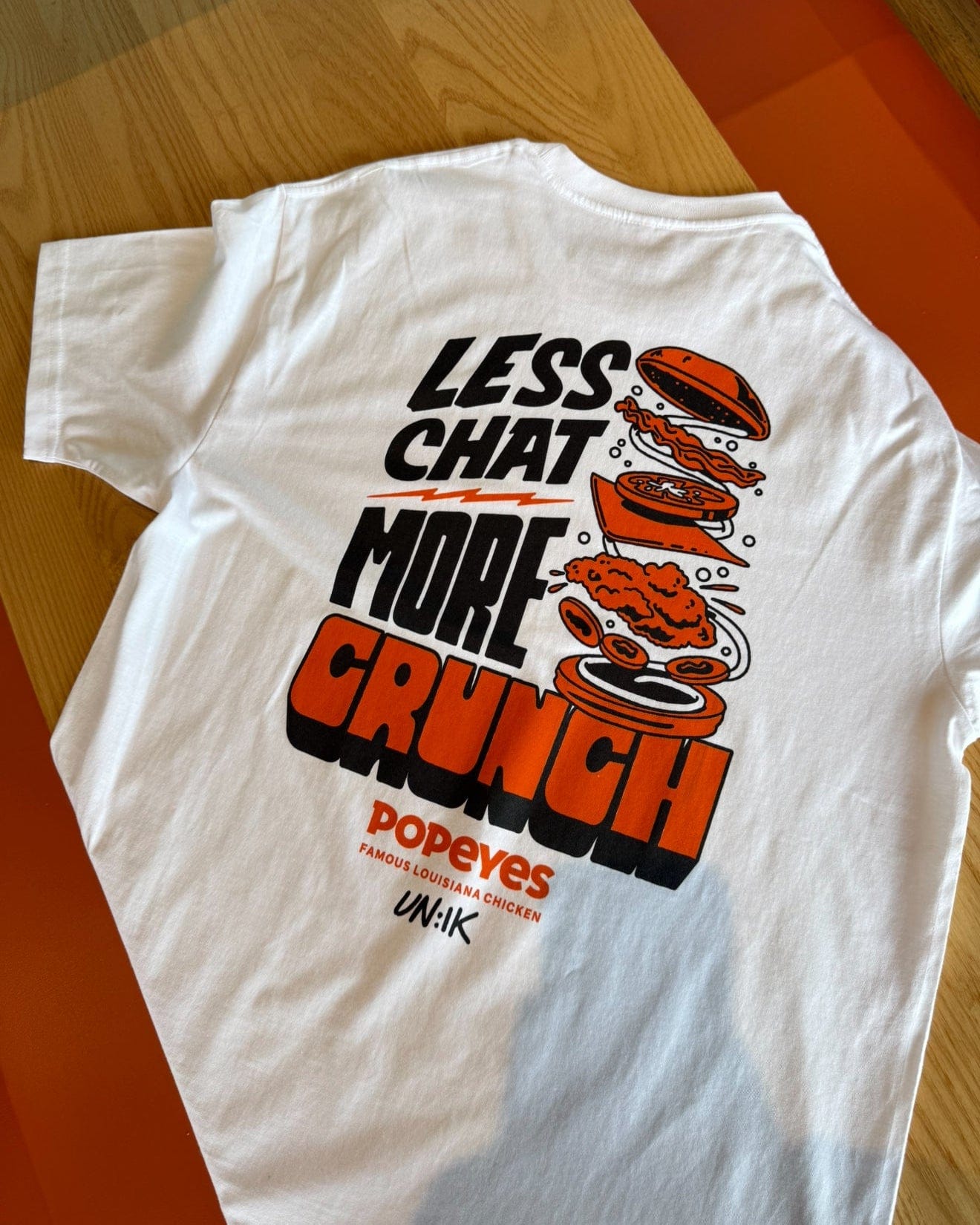 Popeyes x UN:IK Popeyes 'Less Chat, More Crunch' Tee - White