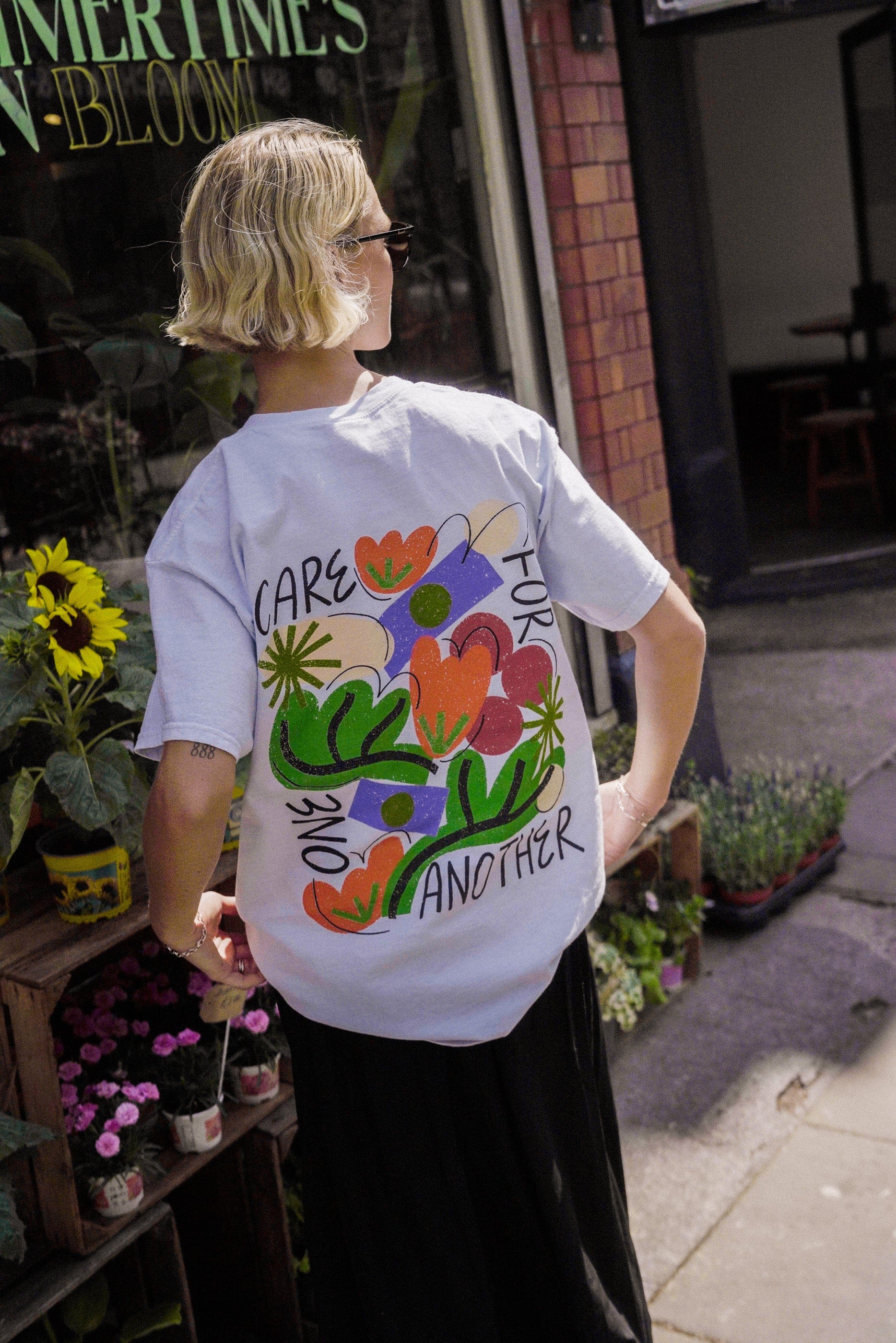 C.D x UN:IK 'Care For One Another' Washed Tee - Light Blue