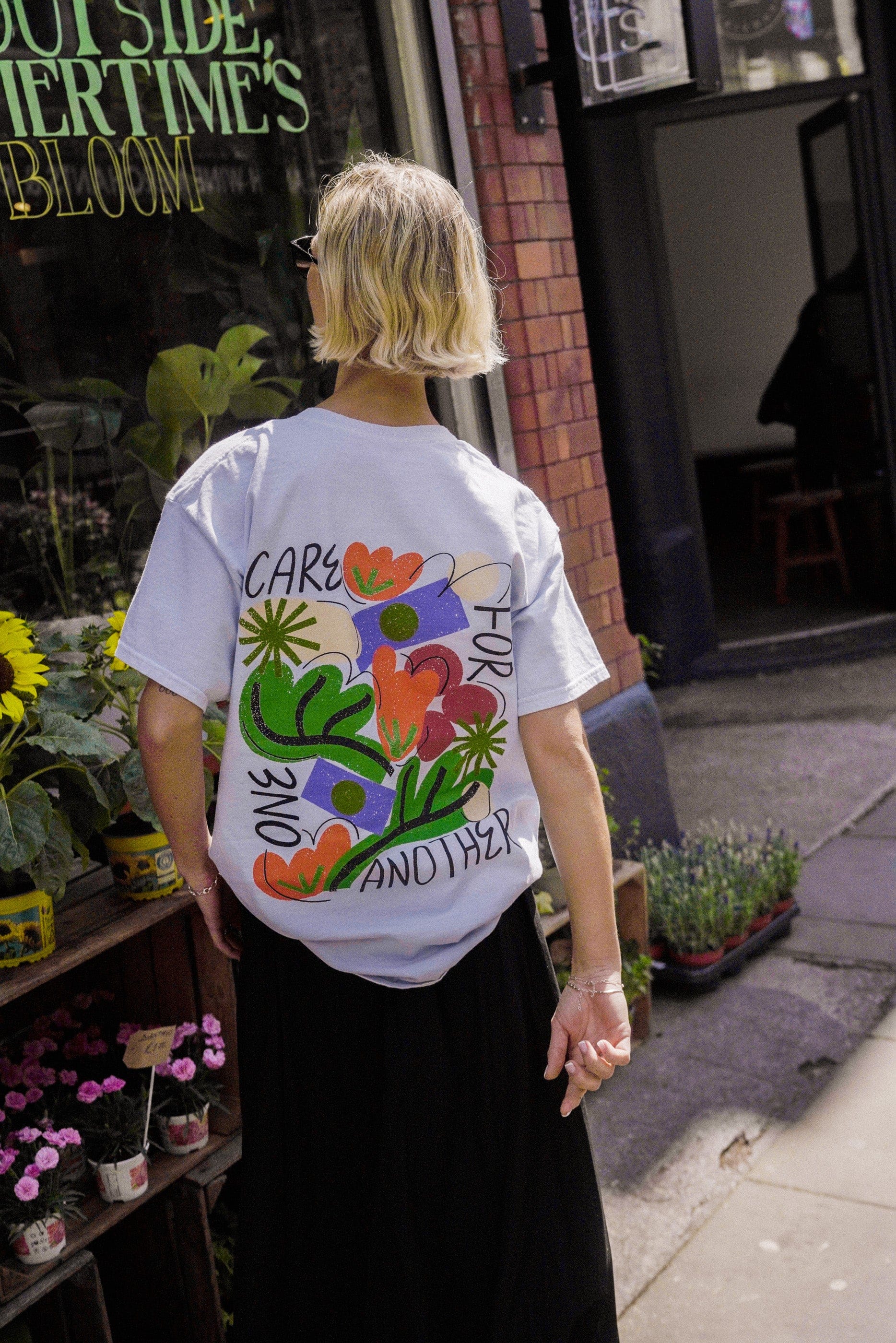 C.D x UN:IK 'Care For One Another' Washed Tee - Light Blue