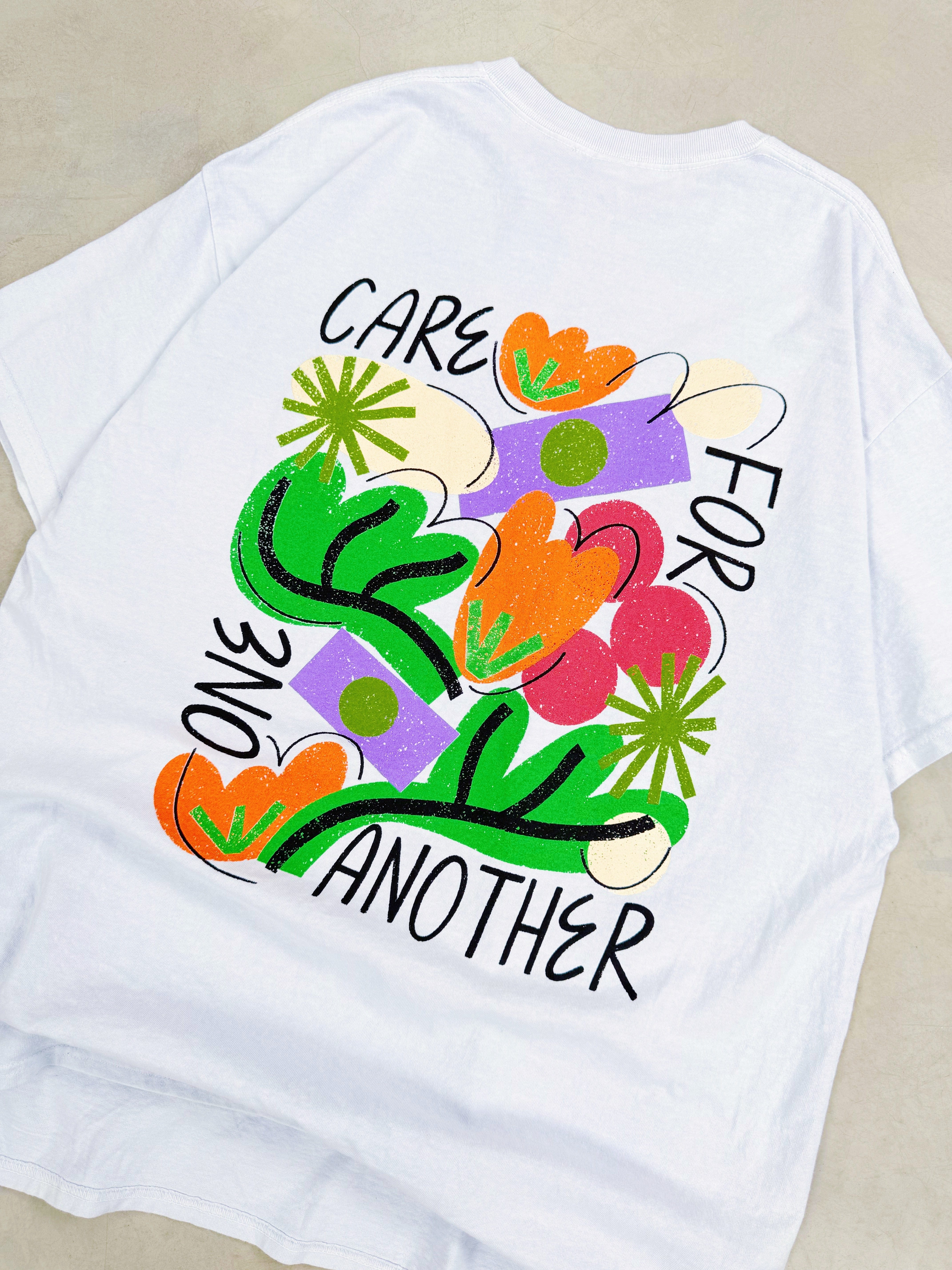 C.D x UN:IK 'Care For One Another' Washed Tee - Light Blue