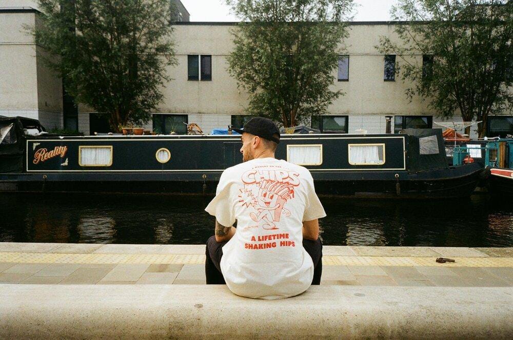 Pomme Frite x UN:IK 'Mr Chips' Tee - Natural