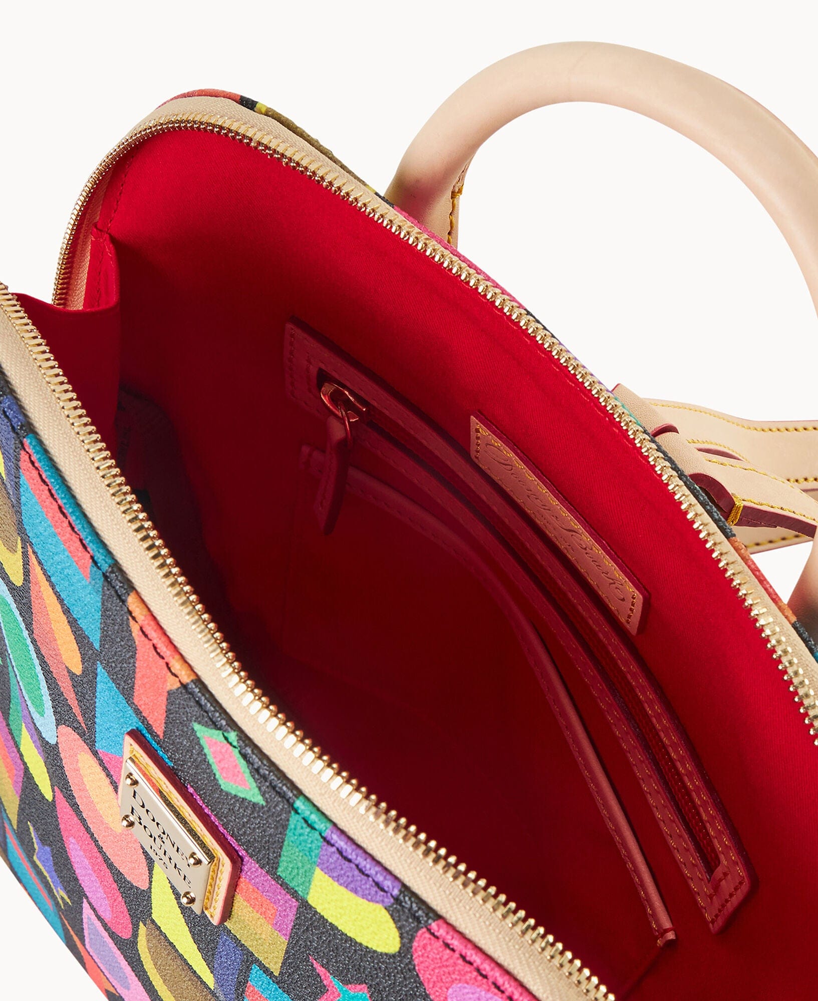 Dooney & Bourke Art Deco Zip Pod Backpack