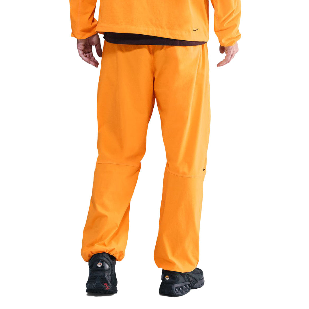 Nike TECH WOVEN PANTS SUNDIAL