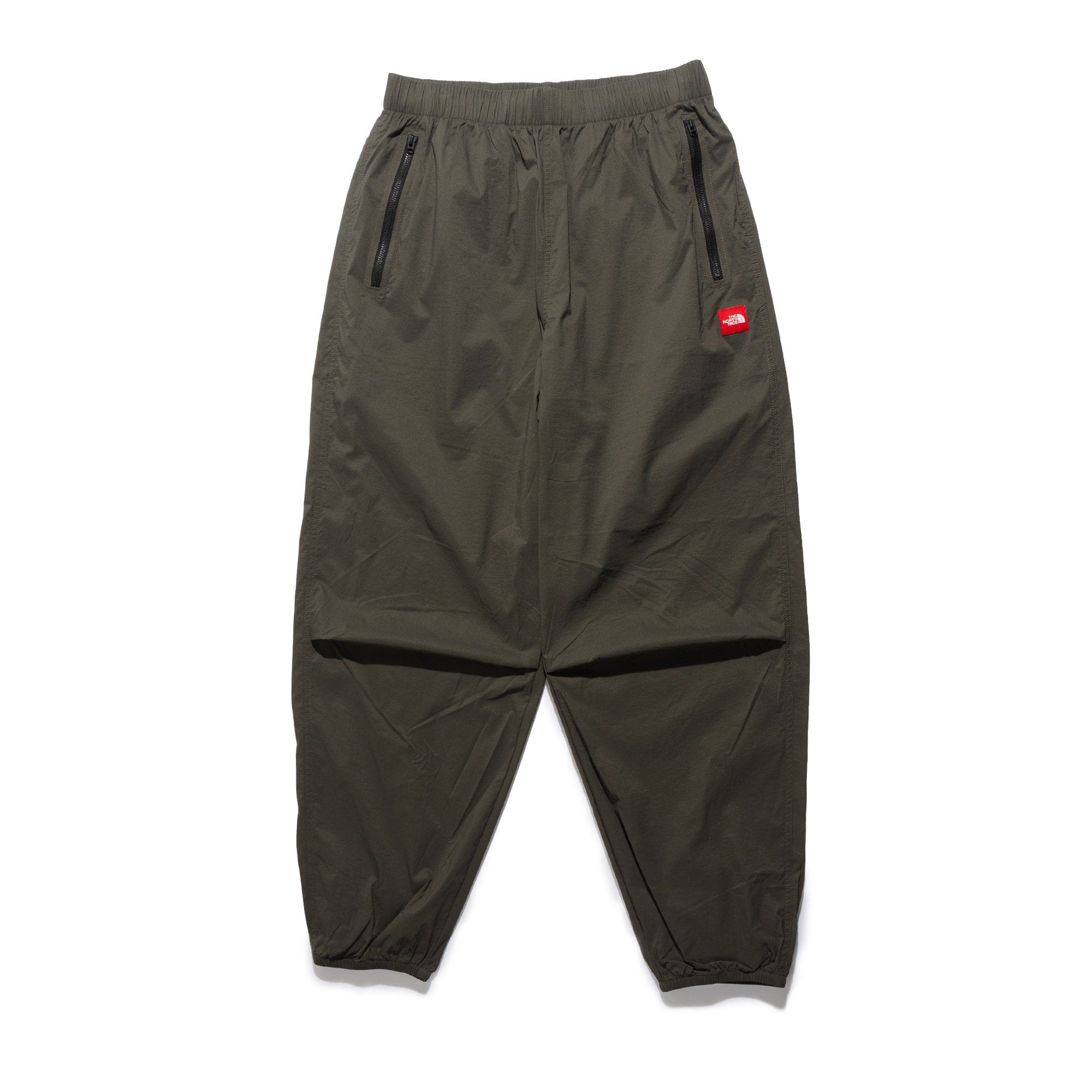 The North Face TNF Red Box Wind Pants Taupe Green NF0A8EFV21L1