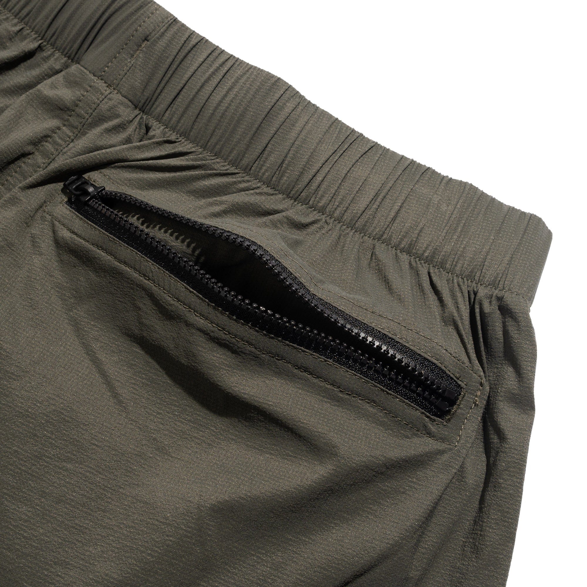 The North Face TNF Red Box Wind Pants Taupe Green NF0A8EFV21L1