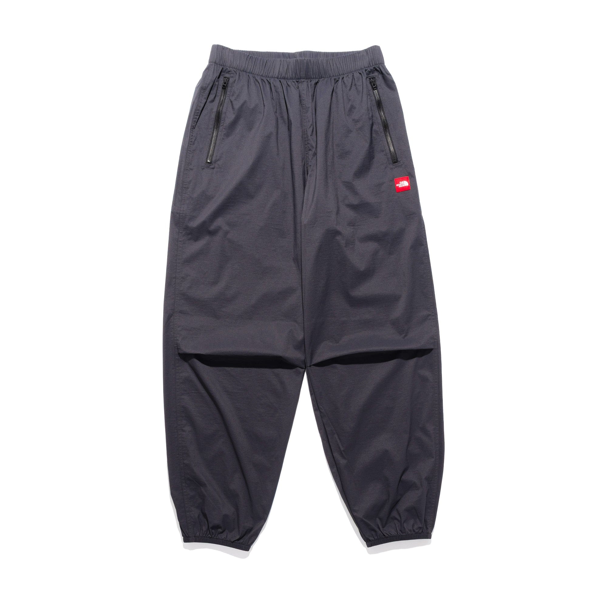 The North Face TNF Red Box Wind Pant Obsidian NF0A8EFV