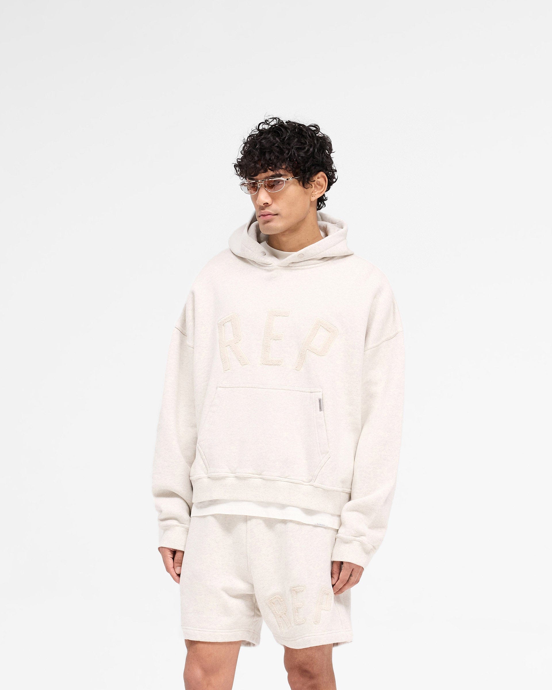 SS25 Rep Applique Hoodie - Cream Marl