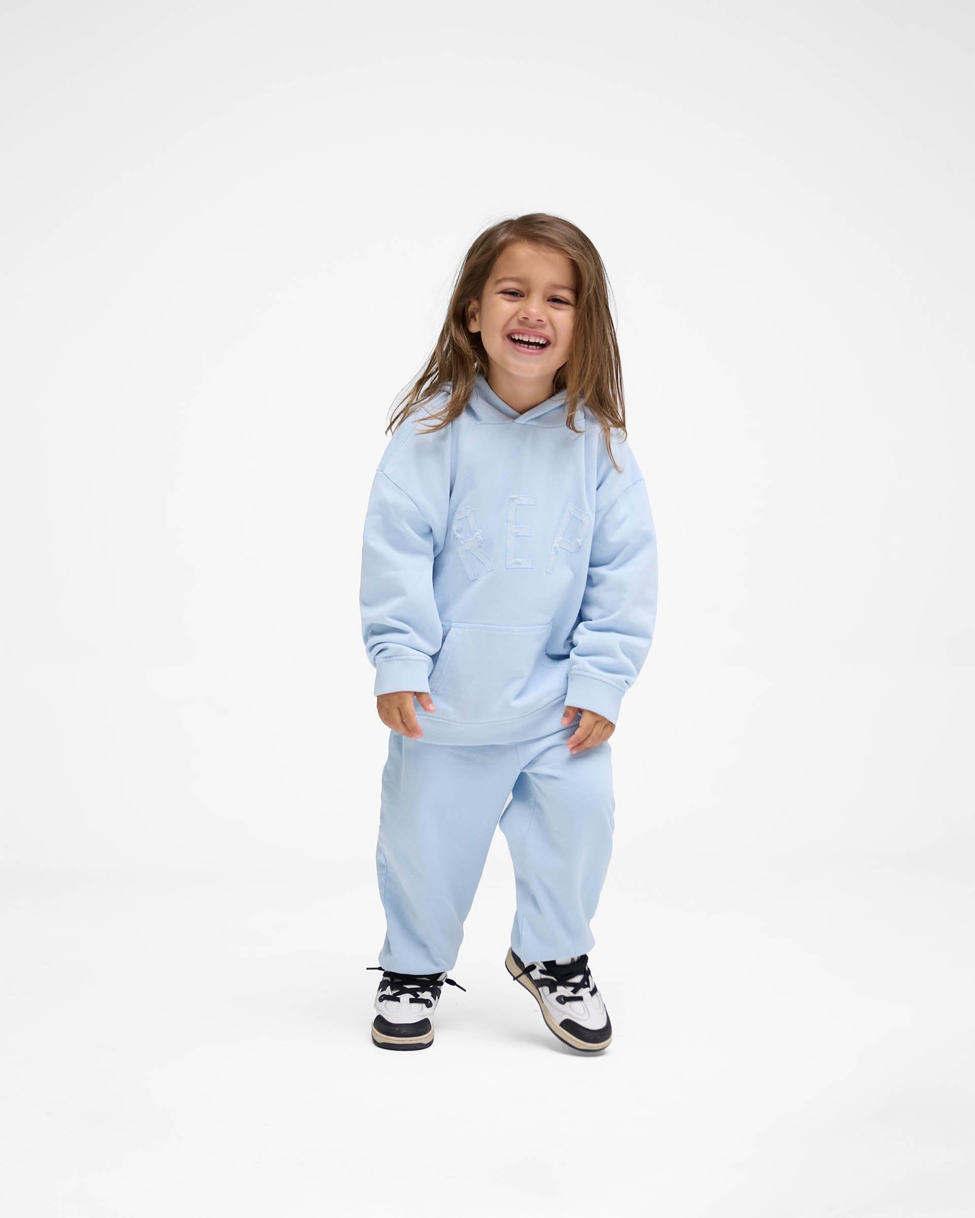 FW24 Mini Rep Applique Hoodie - Powder Blue