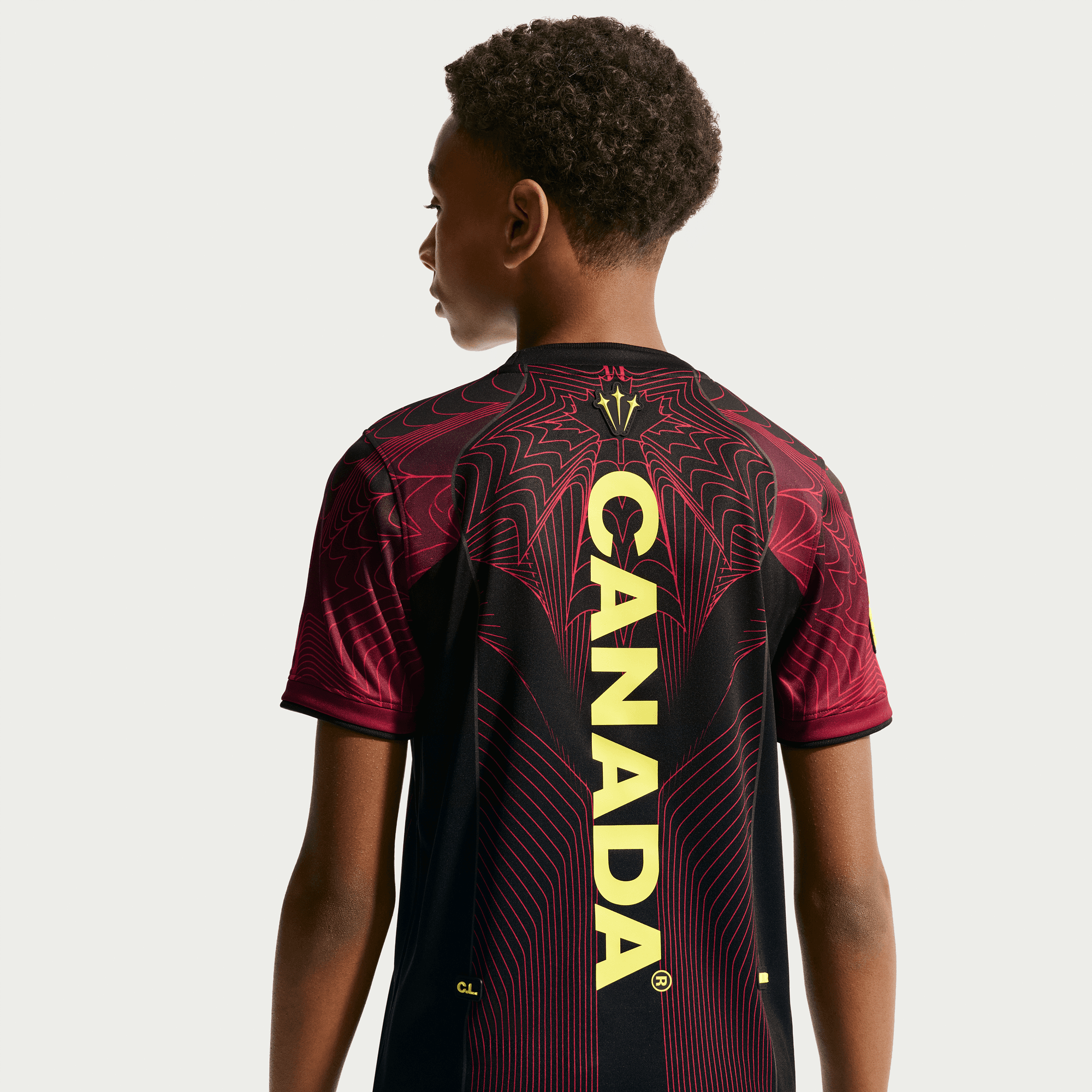 Nike CANADA X NOCTA X NIKE "X2" KIDS DRI-FIT PREMATCH JERSEY - BLACK / GYM RED