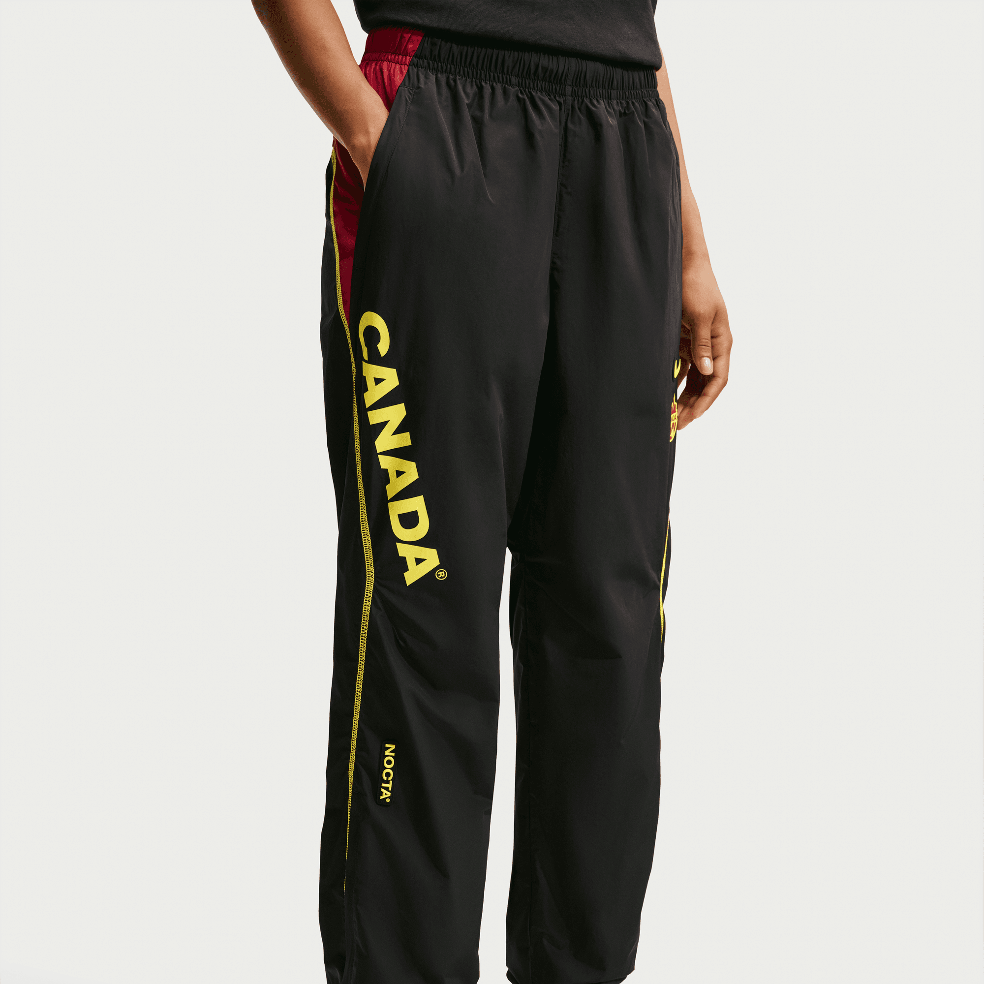 Nike CANADA X NOCTA X NIKE "X2" NORTHSTAR NYLON TRACK PANT - BLACK / GYM RED