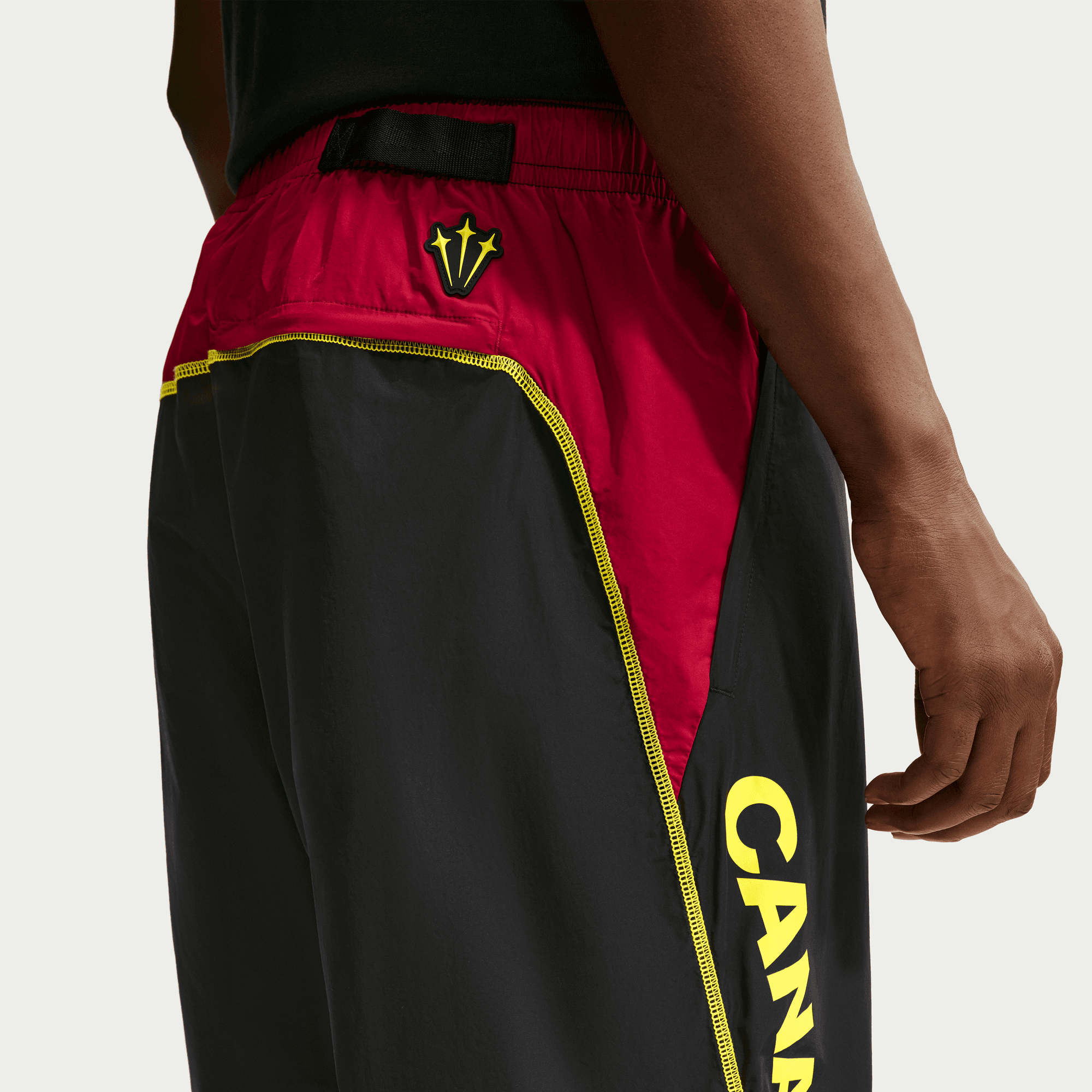 Nike CANADA X NOCTA X NIKE "X2" NORTHSTAR NYLON TRACK PANT - BLACK / GYM RED