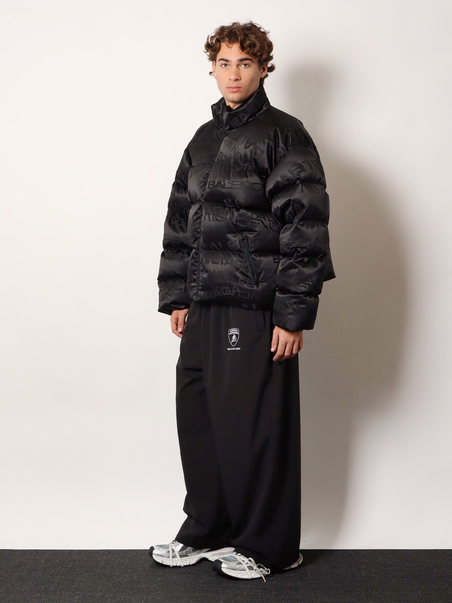 Balenciaga Nylon down jacket with all-over lettering logo