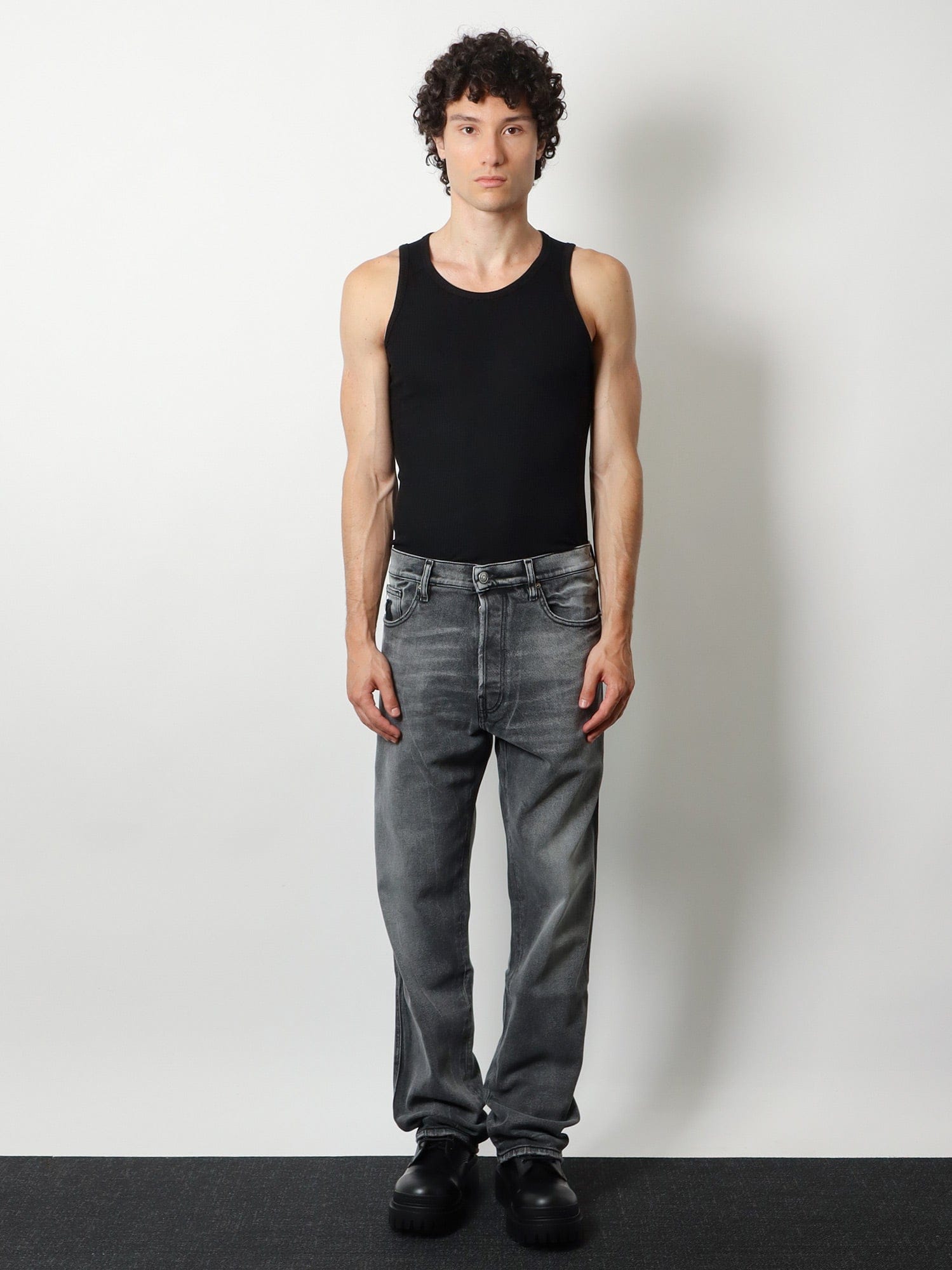 NUMERI 123456789 Denim trousers with back logo patch