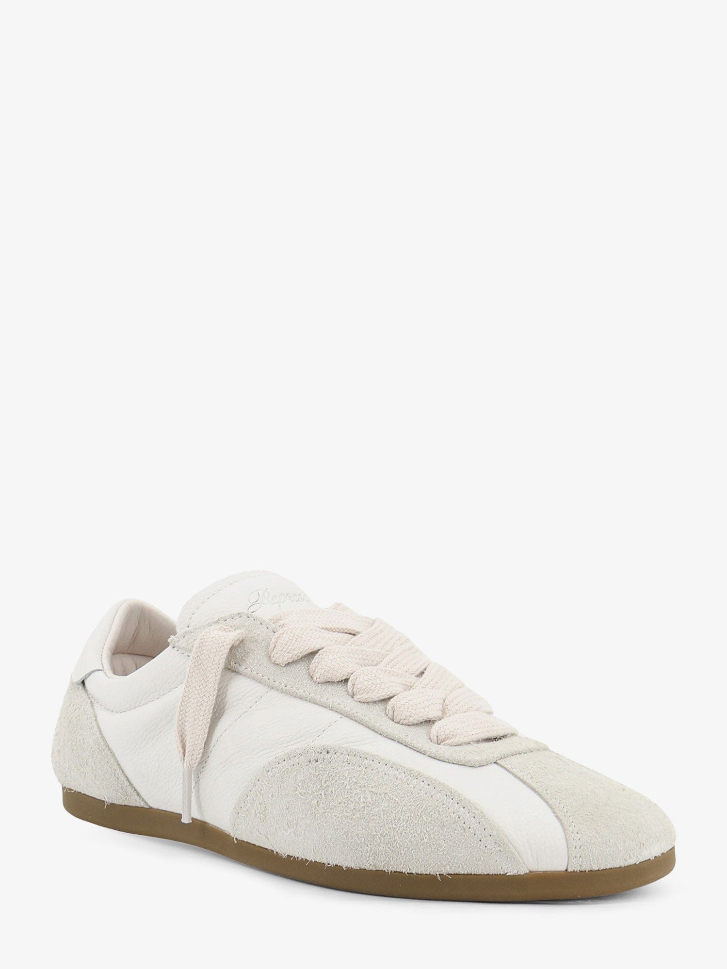 Represent Leather and suede sneakers with engraved logo on the tongue