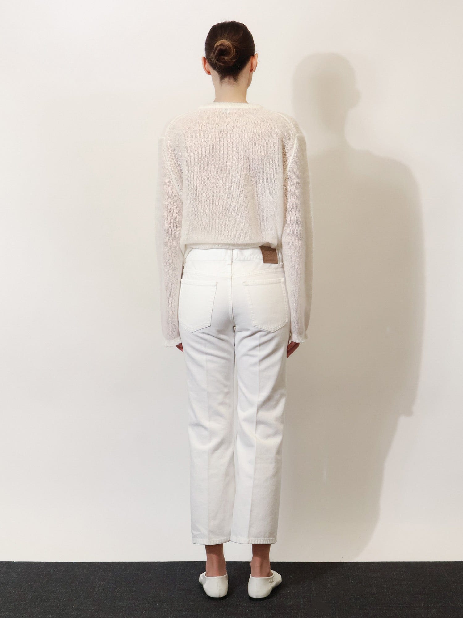 TOTEME White denim trousers with flared bottom