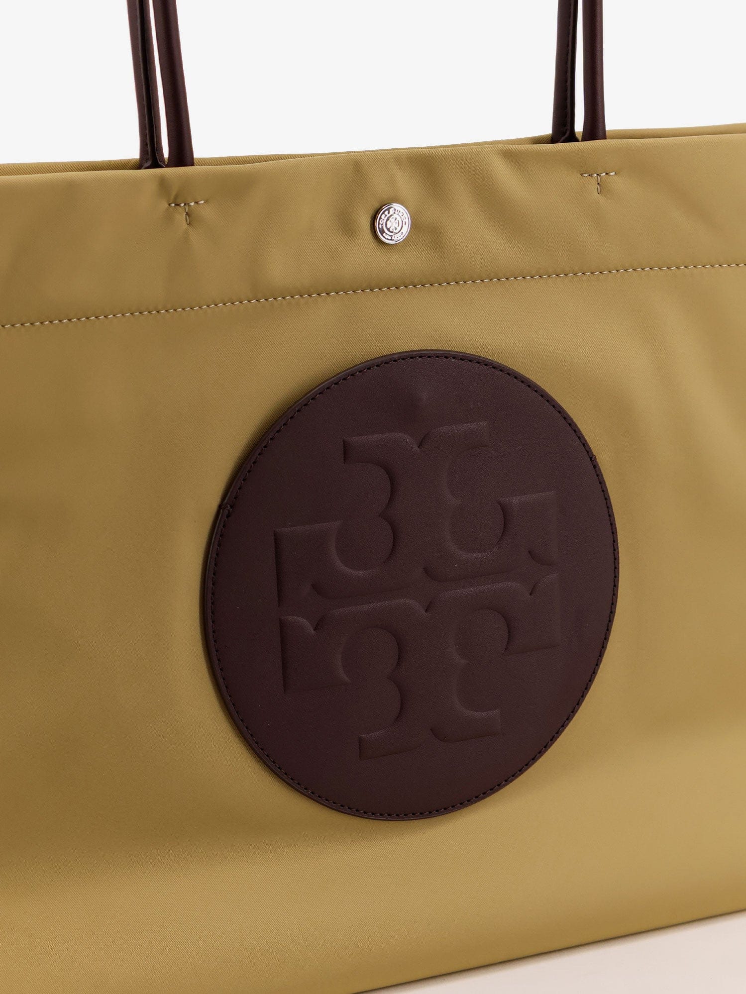 Tory Burch Ella Twist nylon shoulder bag with maxi logo patch on the front