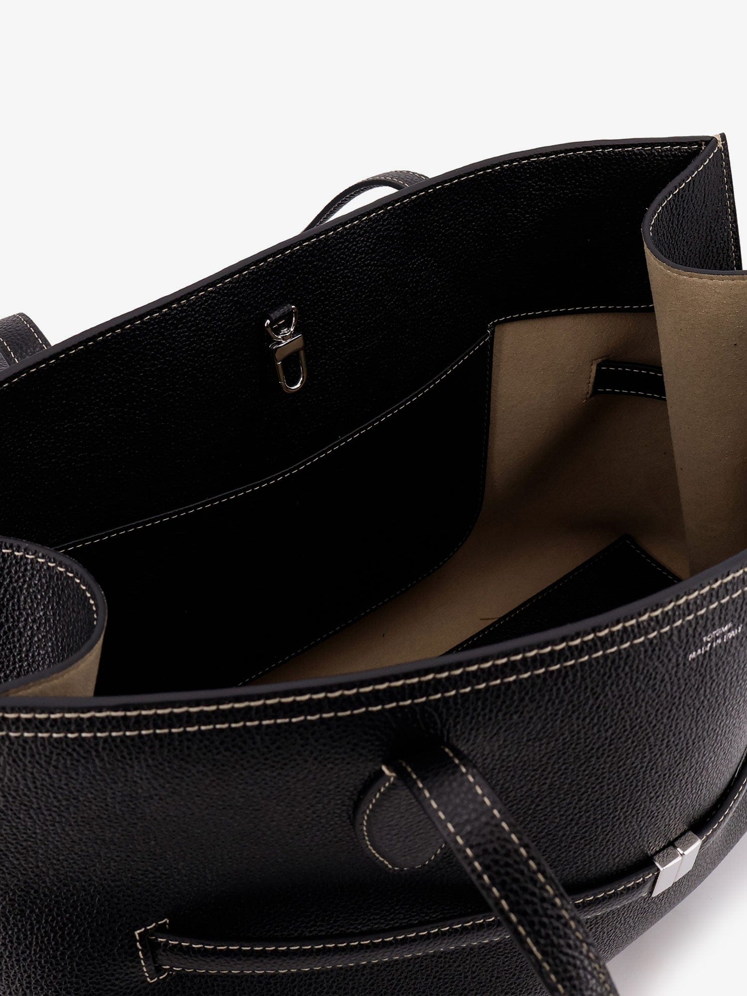 TOTEME Leather shoulder bag with lettering logo on the front