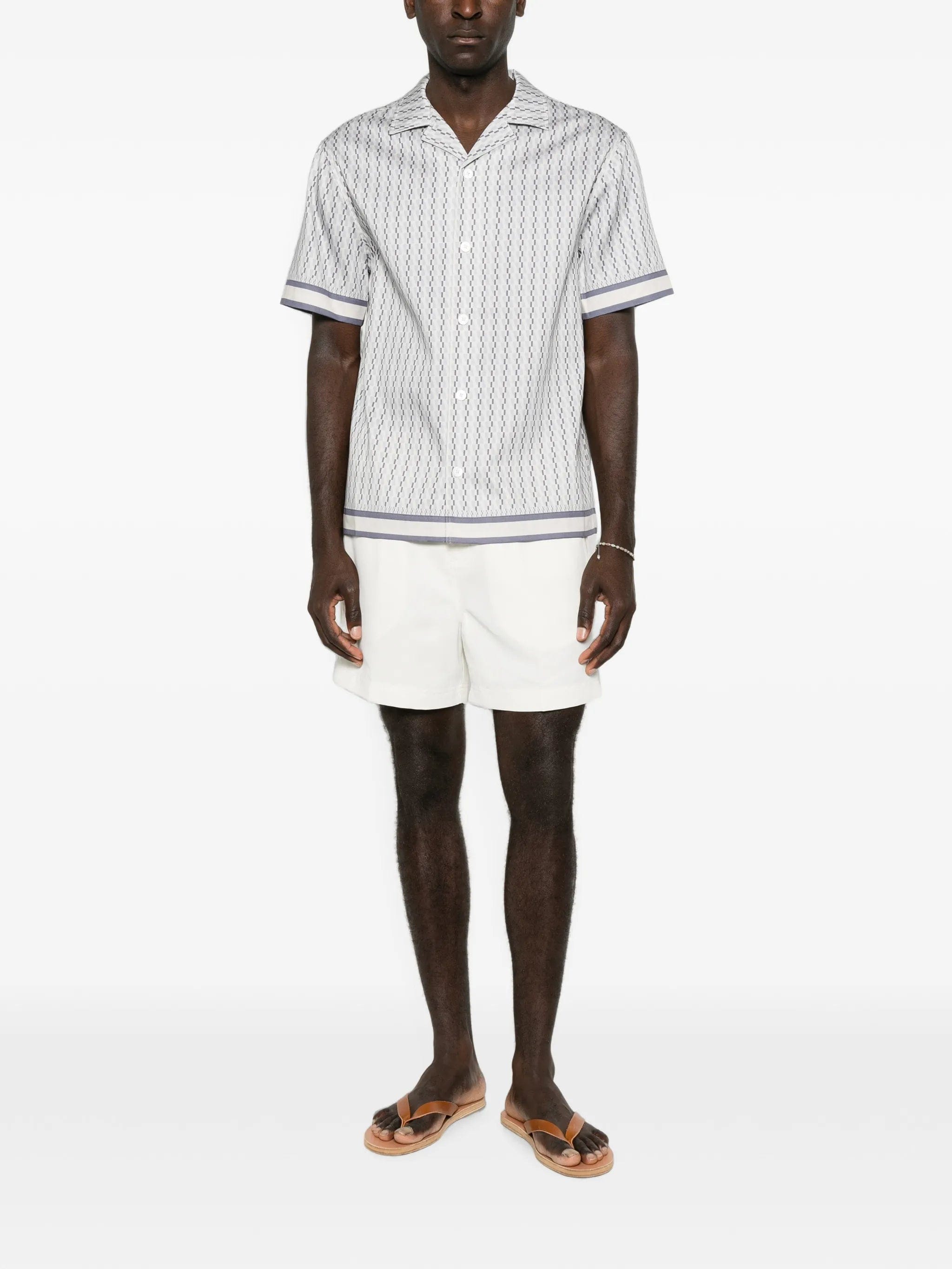 CHÉ Galliano border-print shirt