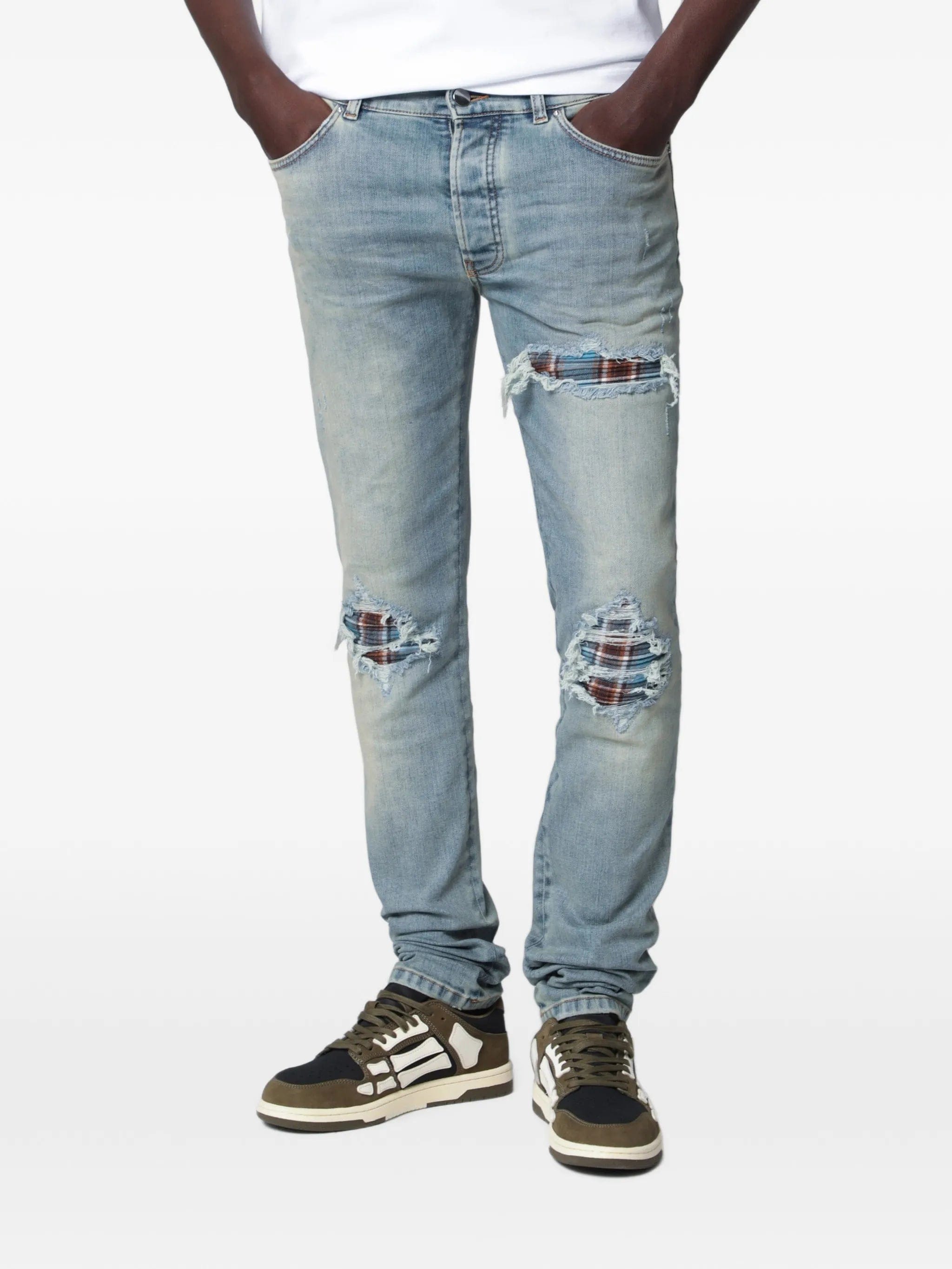 Amiri distressed-effect patched jeans