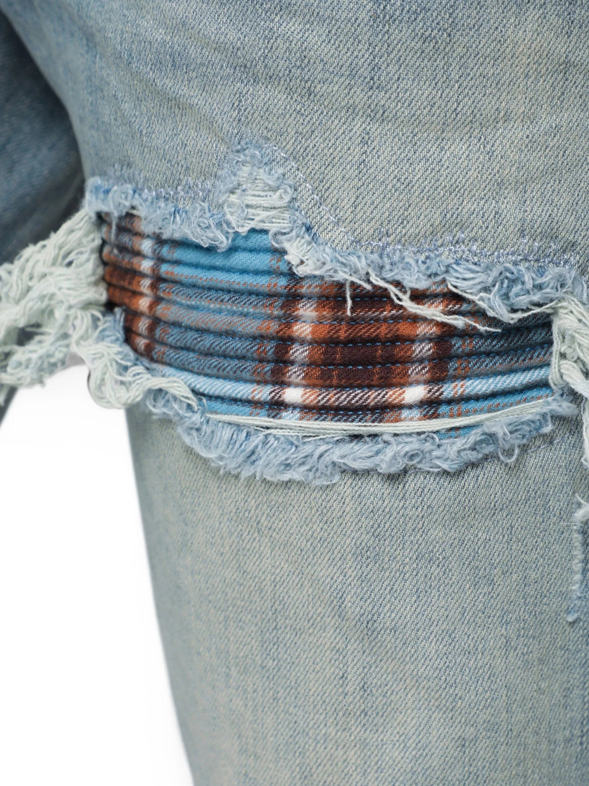 Amiri distressed-effect patched jeans
