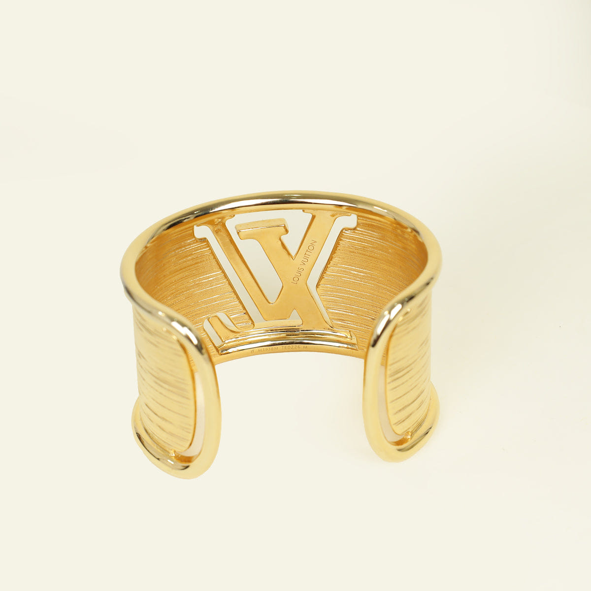 Louis Vuitton Gold Tone Initiales Bracelet