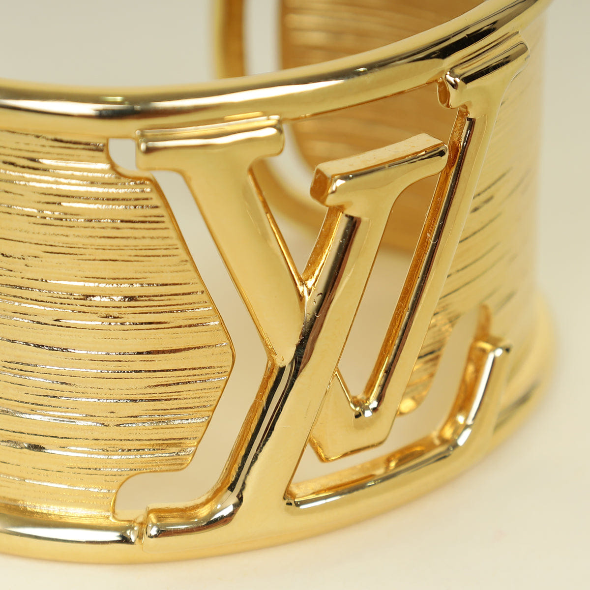 Louis Vuitton Gold Tone Initiales Bracelet