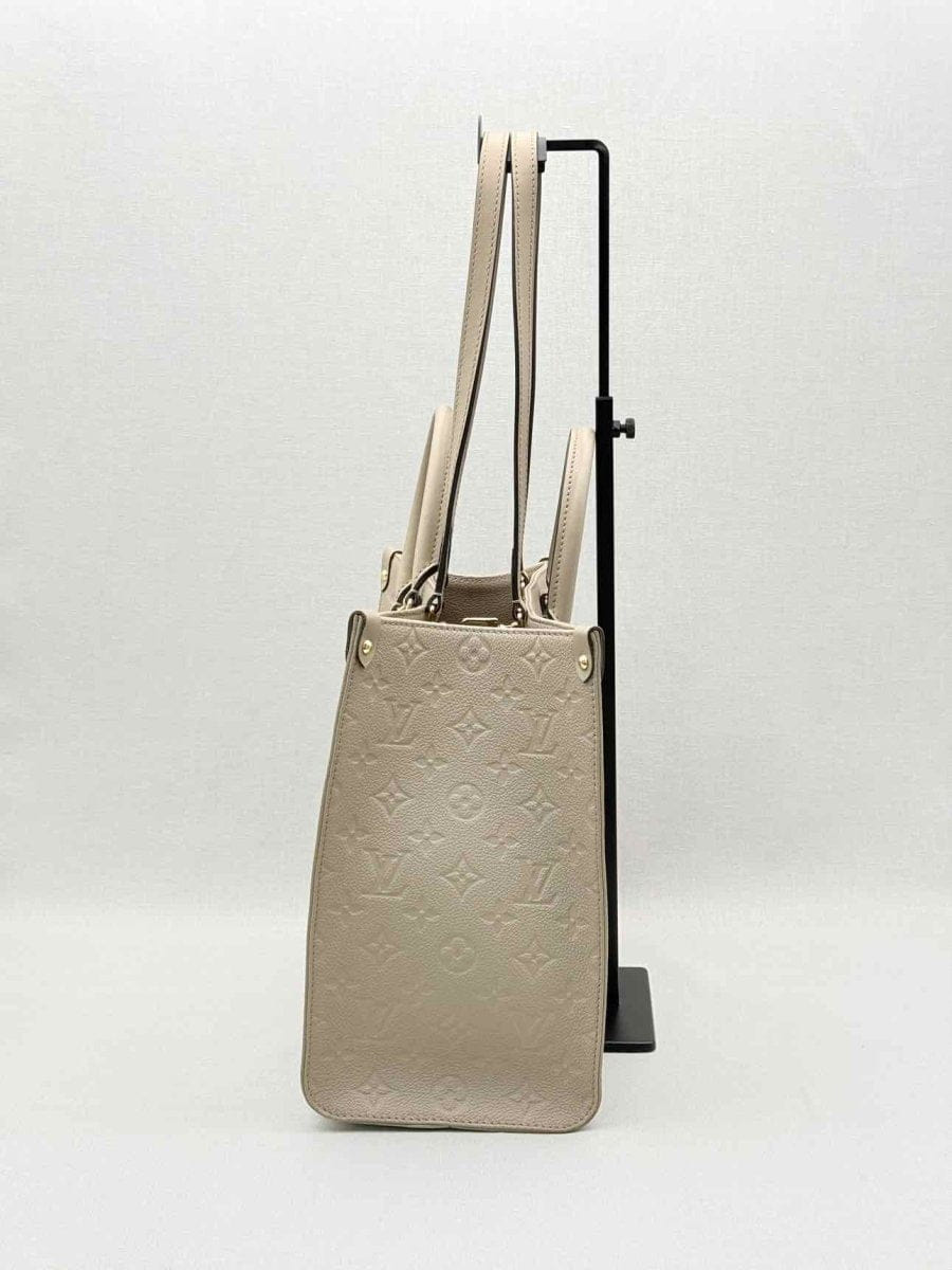 LOUIS VUITTON Onthego Cream Monogram Empriente Tote Bag