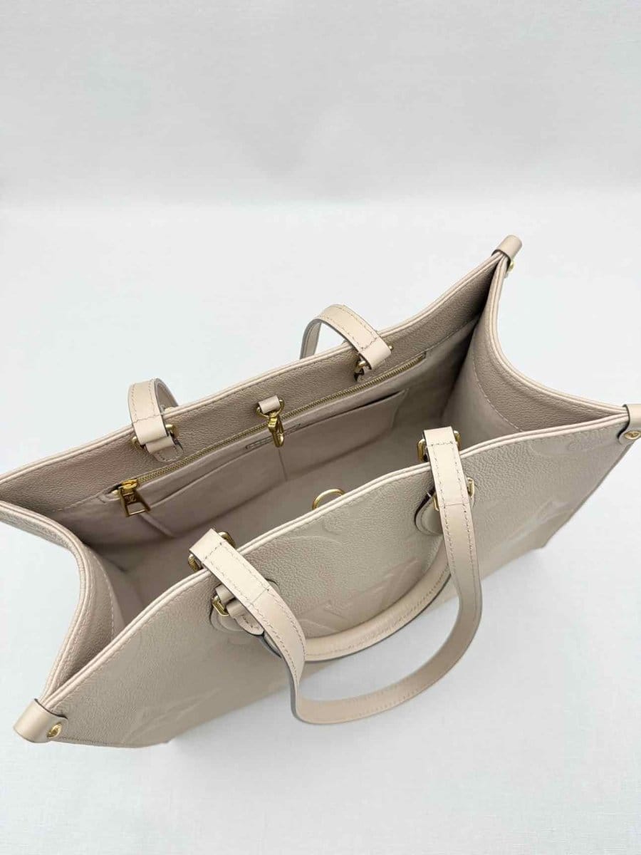 LOUIS VUITTON Onthego Cream Monogram Empriente Tote Bag