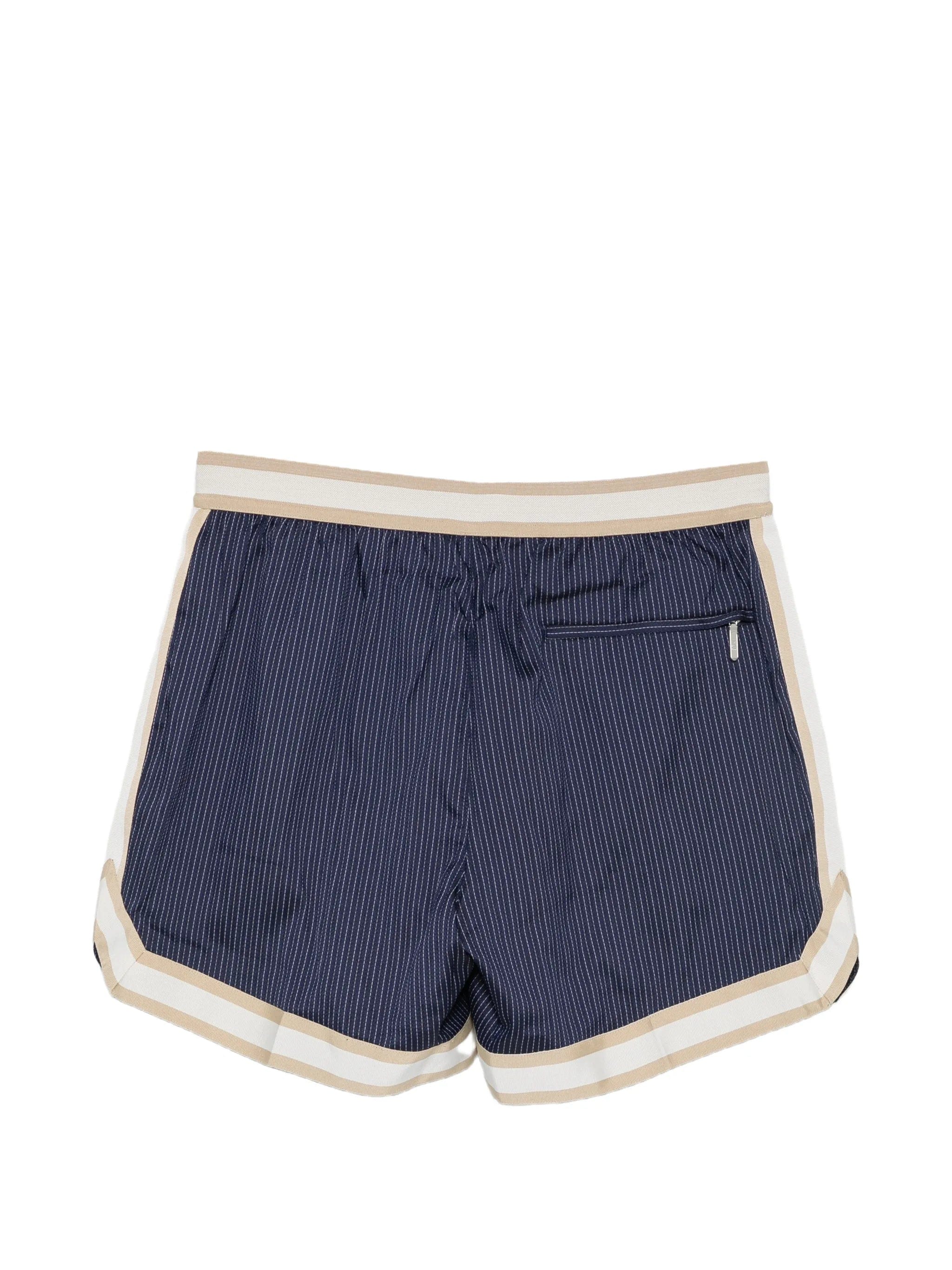 CHÉ Baller pinstriped swim shorts