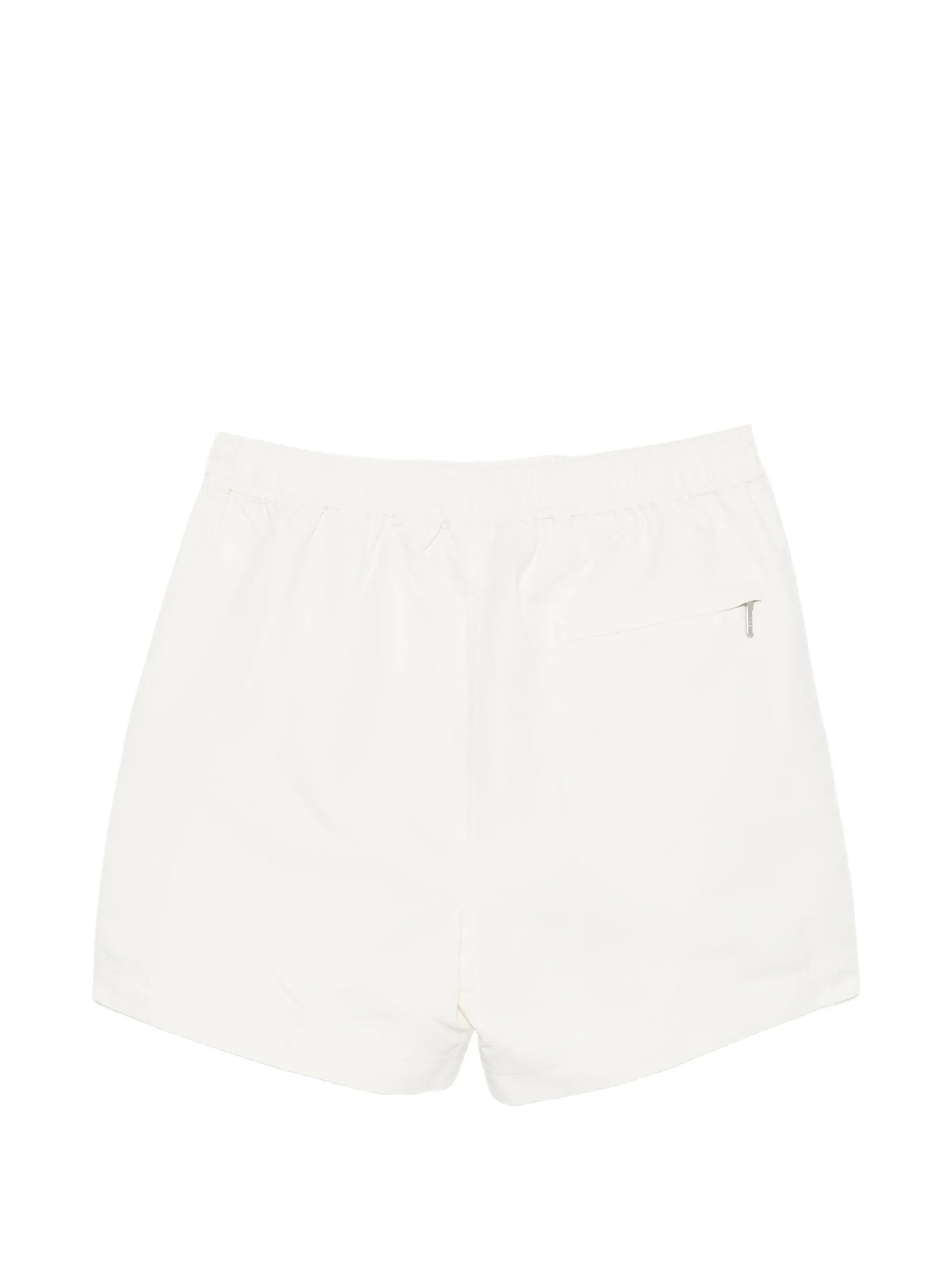 CHÉ button-fastening swim shorts