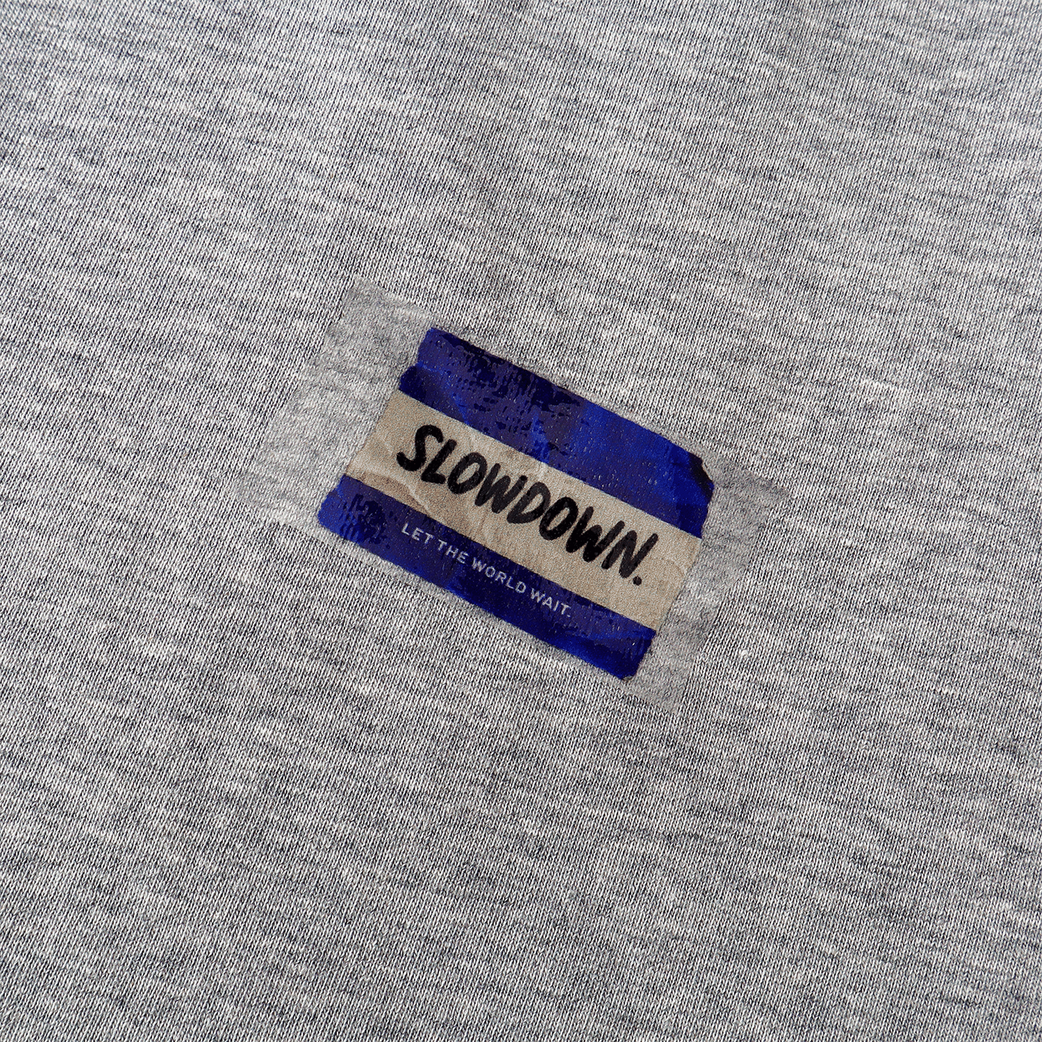 SLOWDOWN Transparent Tape Basic Grey Tee (SS26)