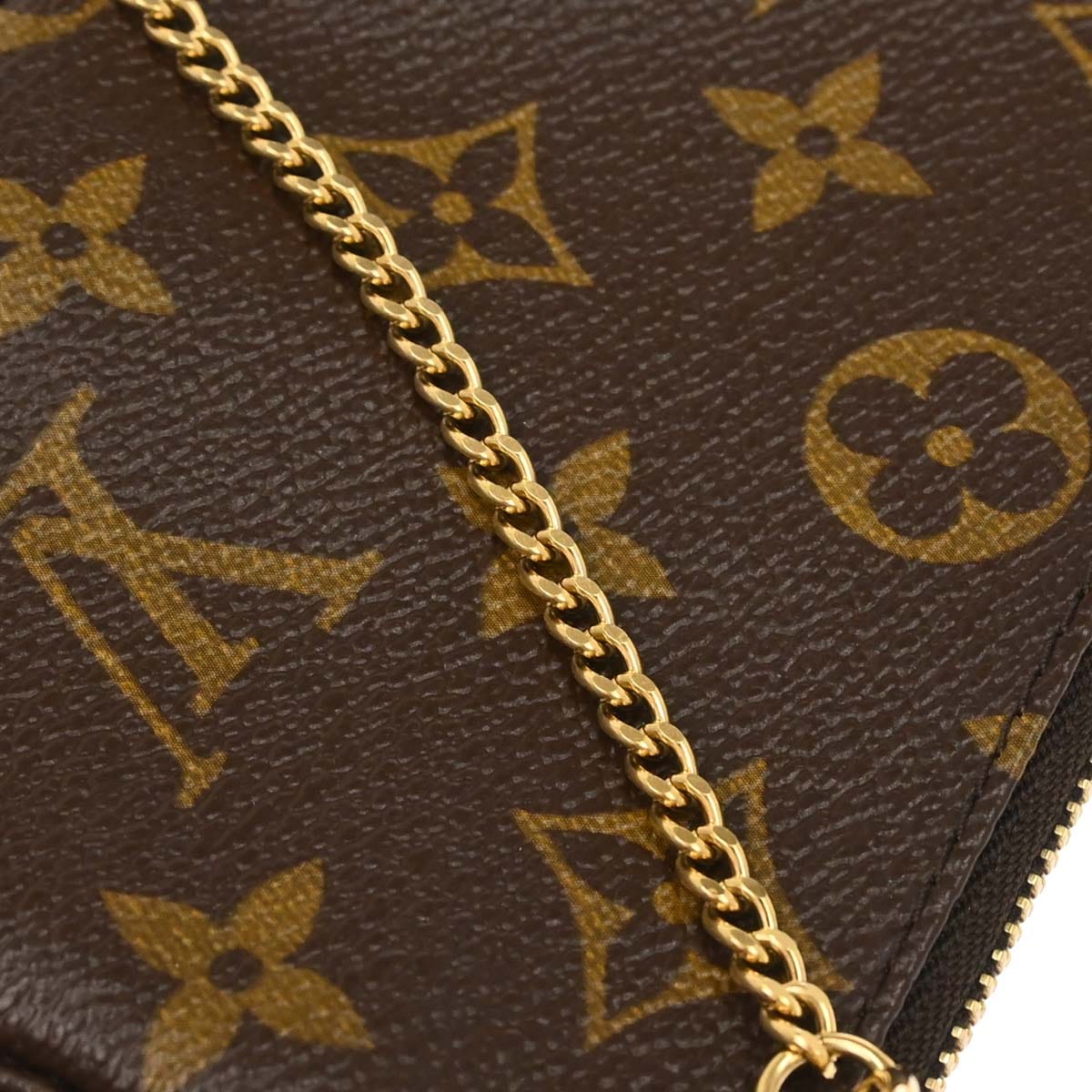 Louis Vuitton 2007 Monogram Mini Pochette Accessoires Handbag M60153