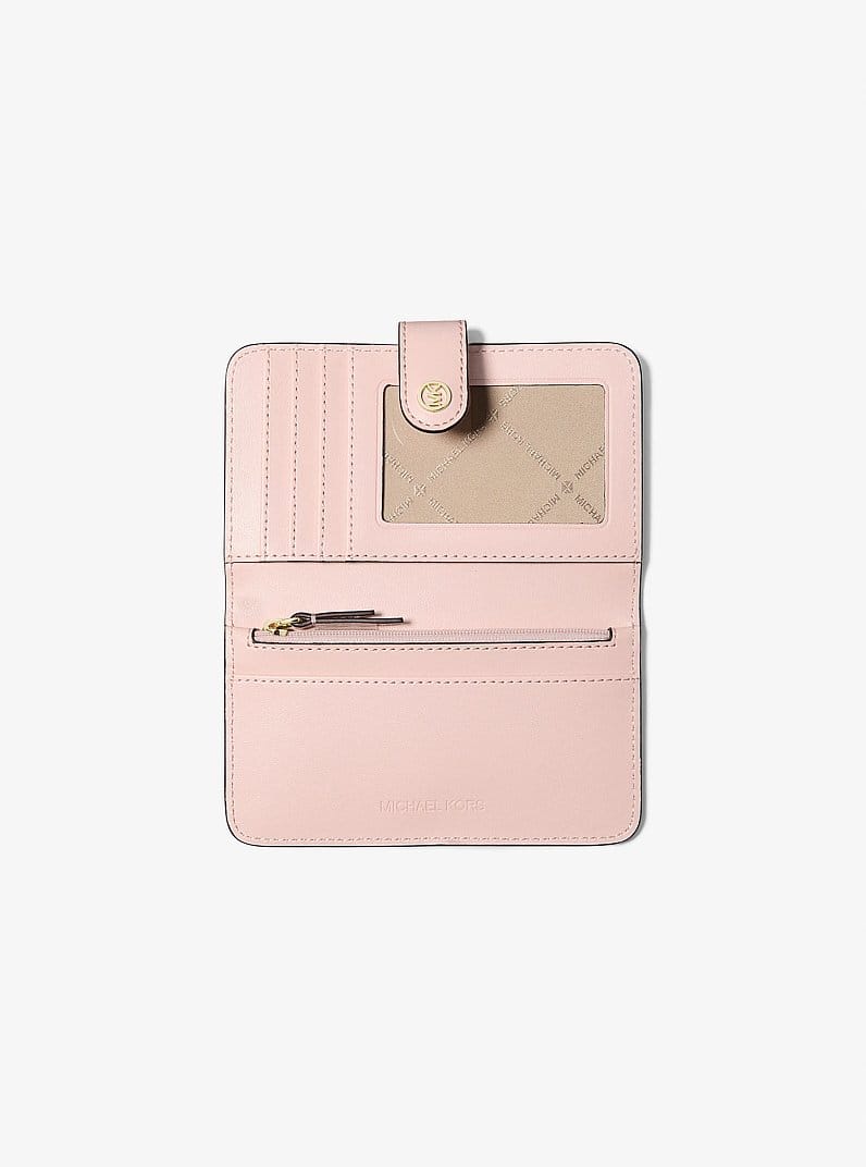 Jet Set Travel Medium Pebbled Leather Billfold Wallet