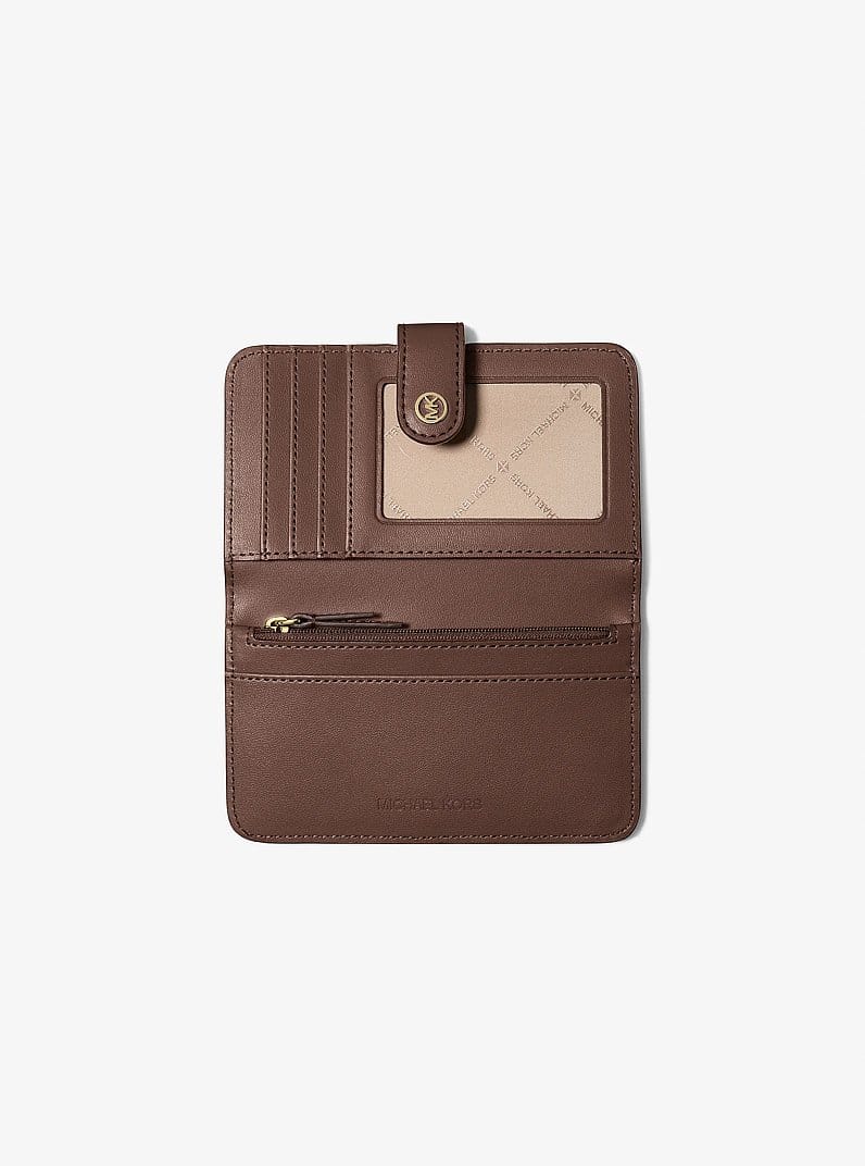 Jet Set Travel Medium Pebbled Leather Billfold Wallet