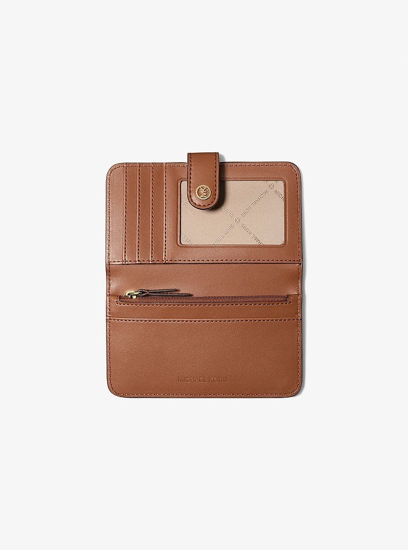 Jet Set Travel Medium Pebbled Leather Billfold Wallet