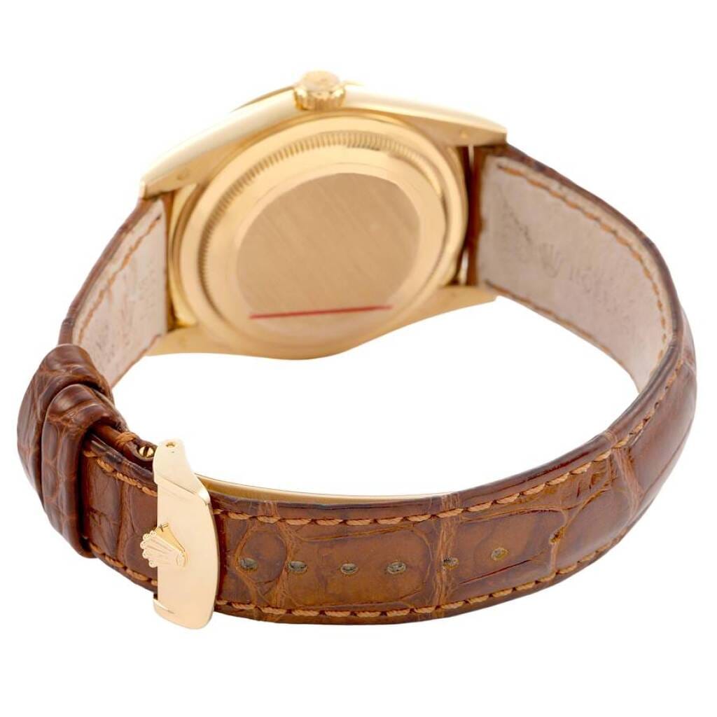 President Day-Date (Reference 118138). A 36mm yellow gold automatic wristwatch with date and day.