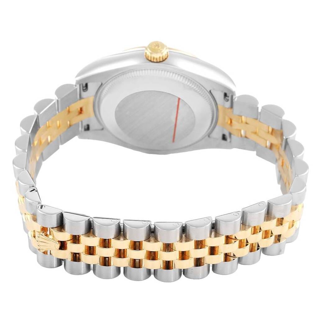 Datejust (Reference 178273). A 31mm yellow gold stainless steel automatic wristwatch with date.