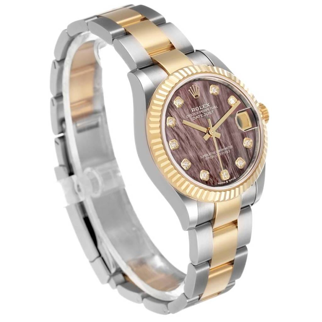 Datejust (Reference 278273). A 31mm unworn yellow gold stainless steel diamond-set automatic wristwatch with date. 2026
