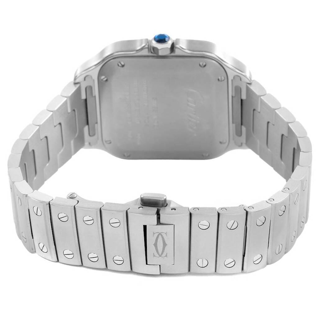 Santos de Cartier Medium (Reference W4SA0005). A 35.1mm stainless steel diamond-set automatic wristwatch. 2023