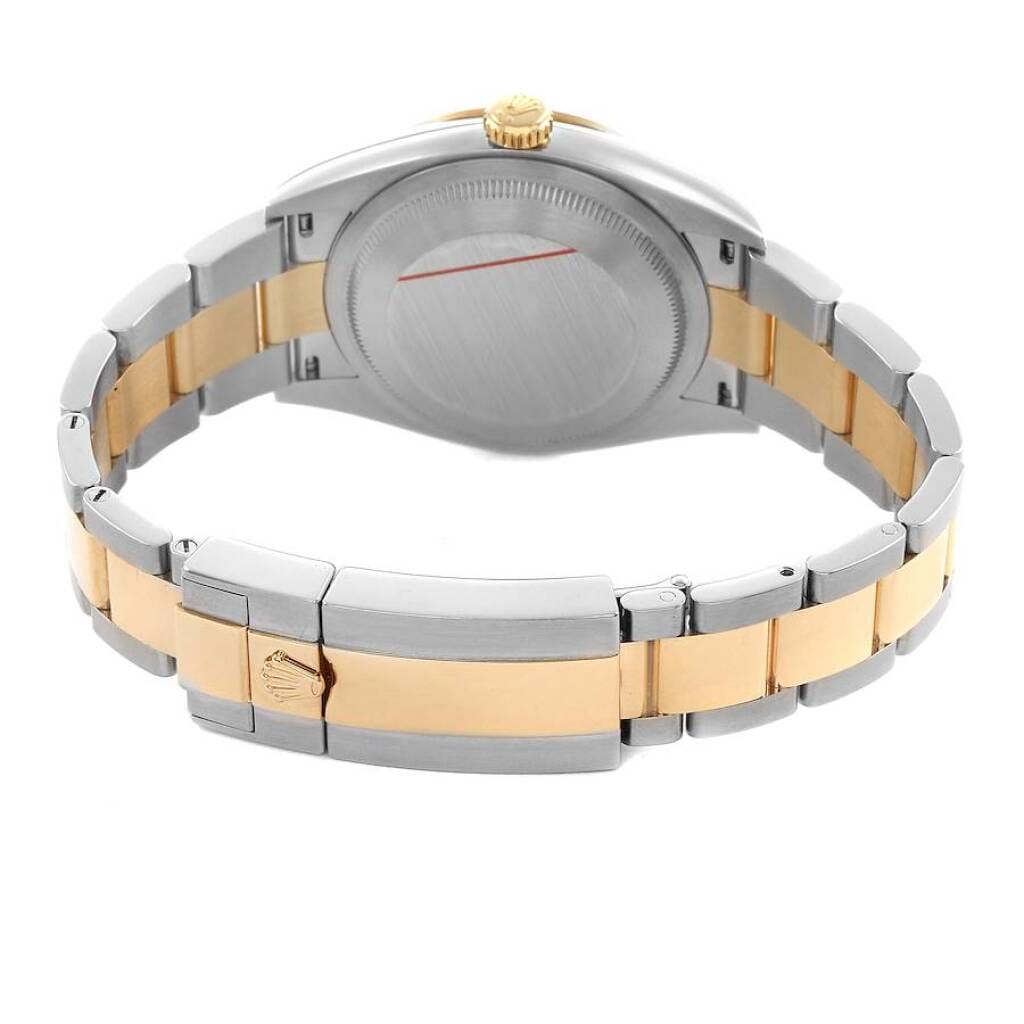 Explorer (Reference 124273). A 36mm yellow gold stainless steel automatic wristwatch. 2021
